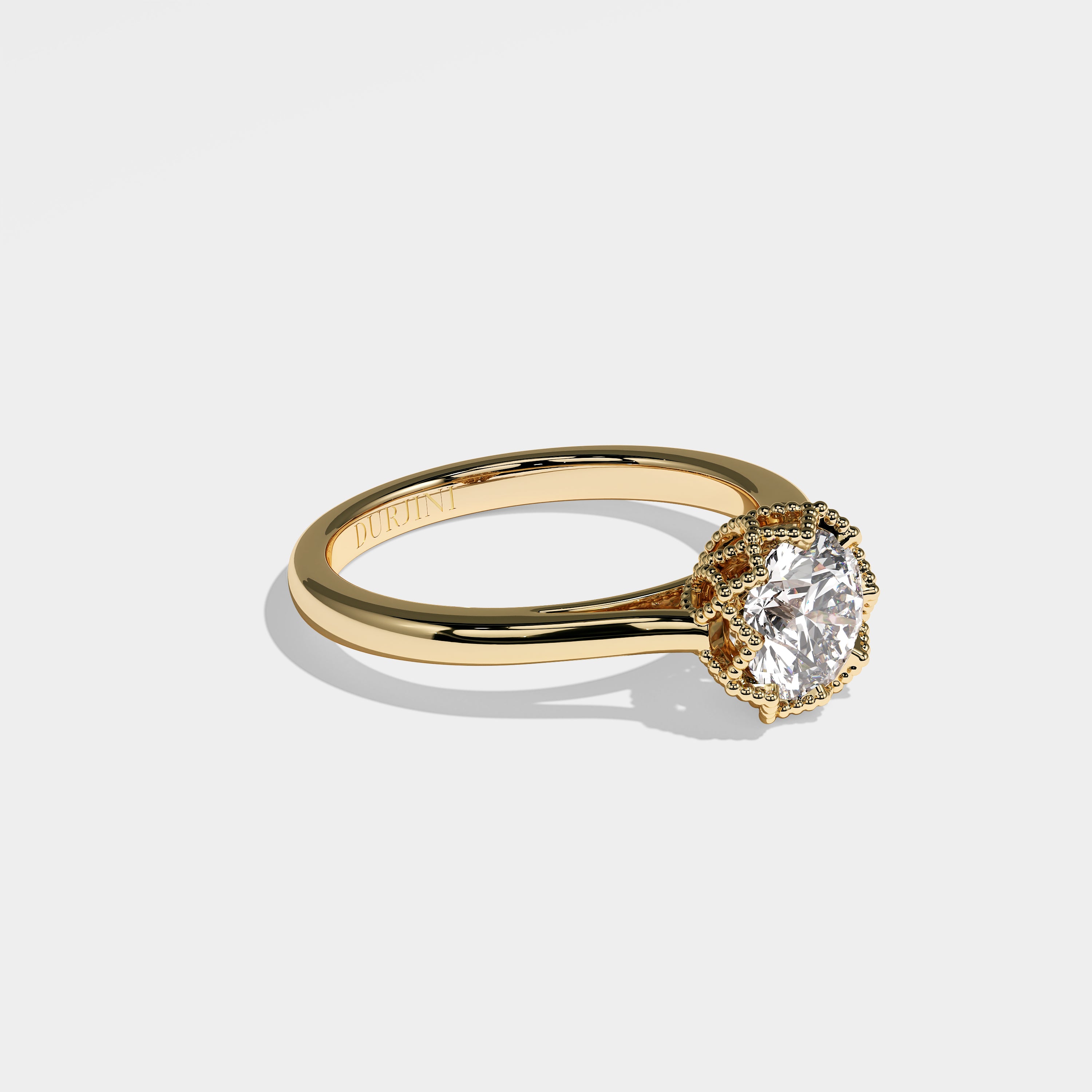 Maple round brilliant diamond engagement ring in 18K yellow gold by Kurbãni Durjini, right view