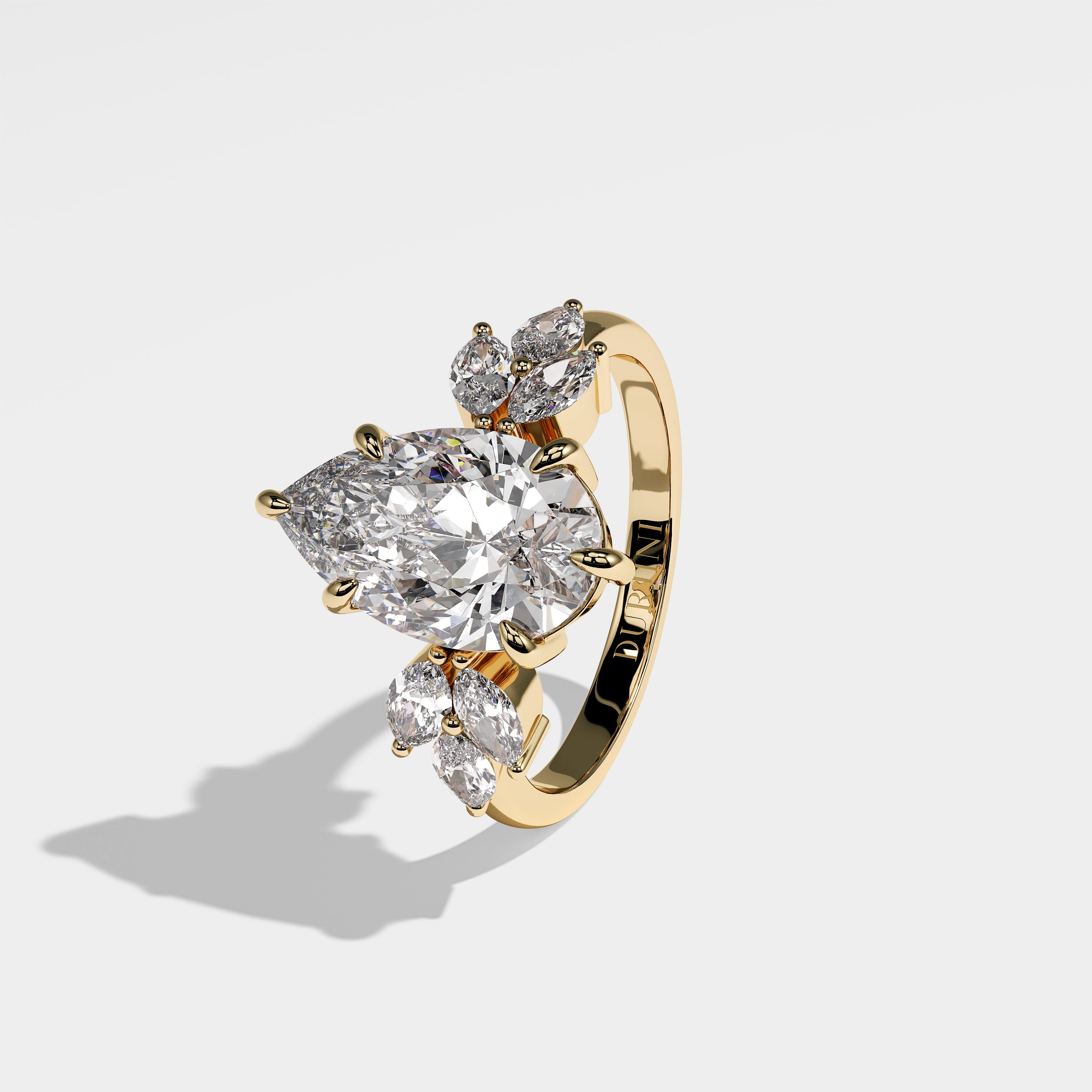 July pear diamond engagement ring in 18K white gold by Kurbãni Durjini, left view