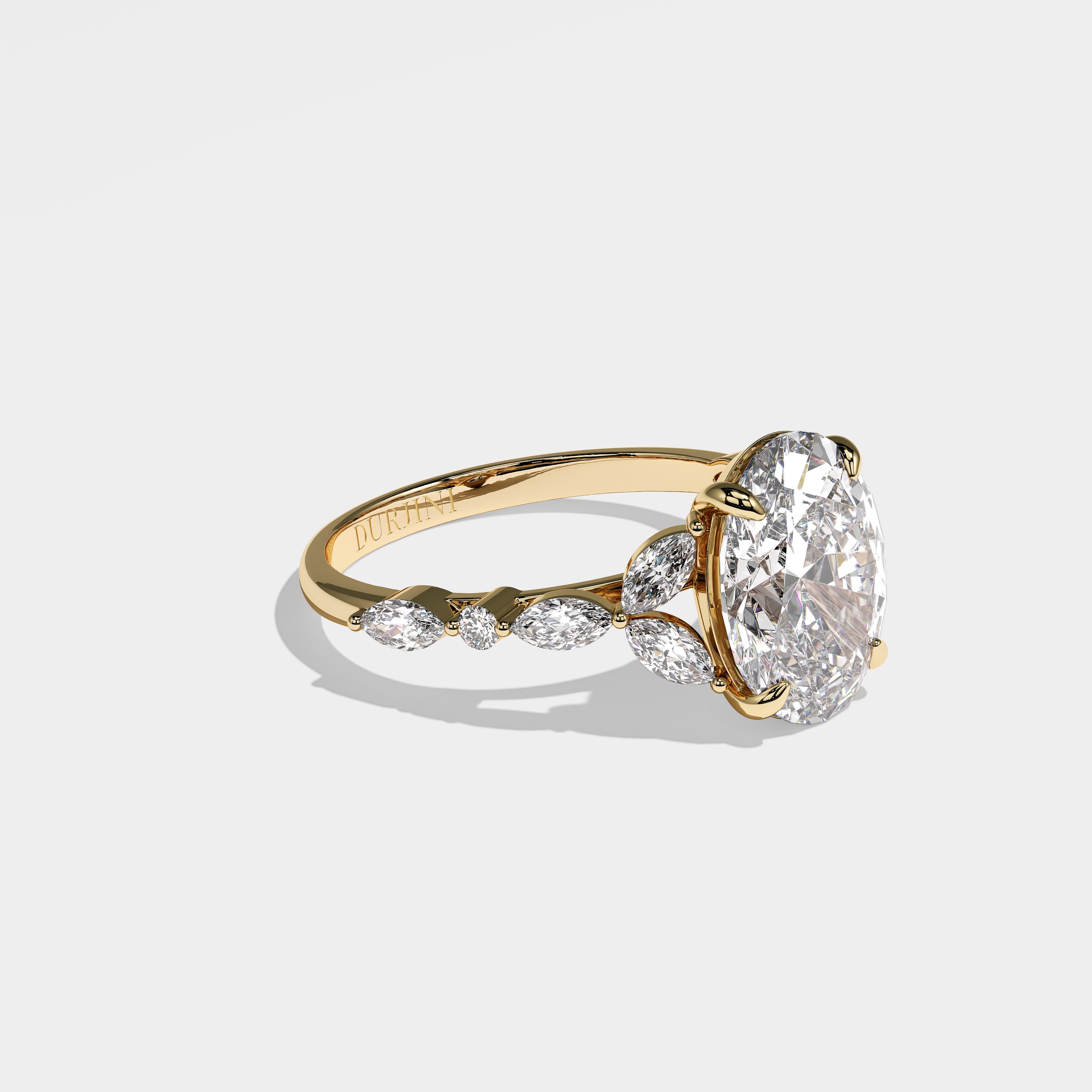 Gate oval diamond engagement ring in 18K yellow gold by Kurbãni Durjini, right view