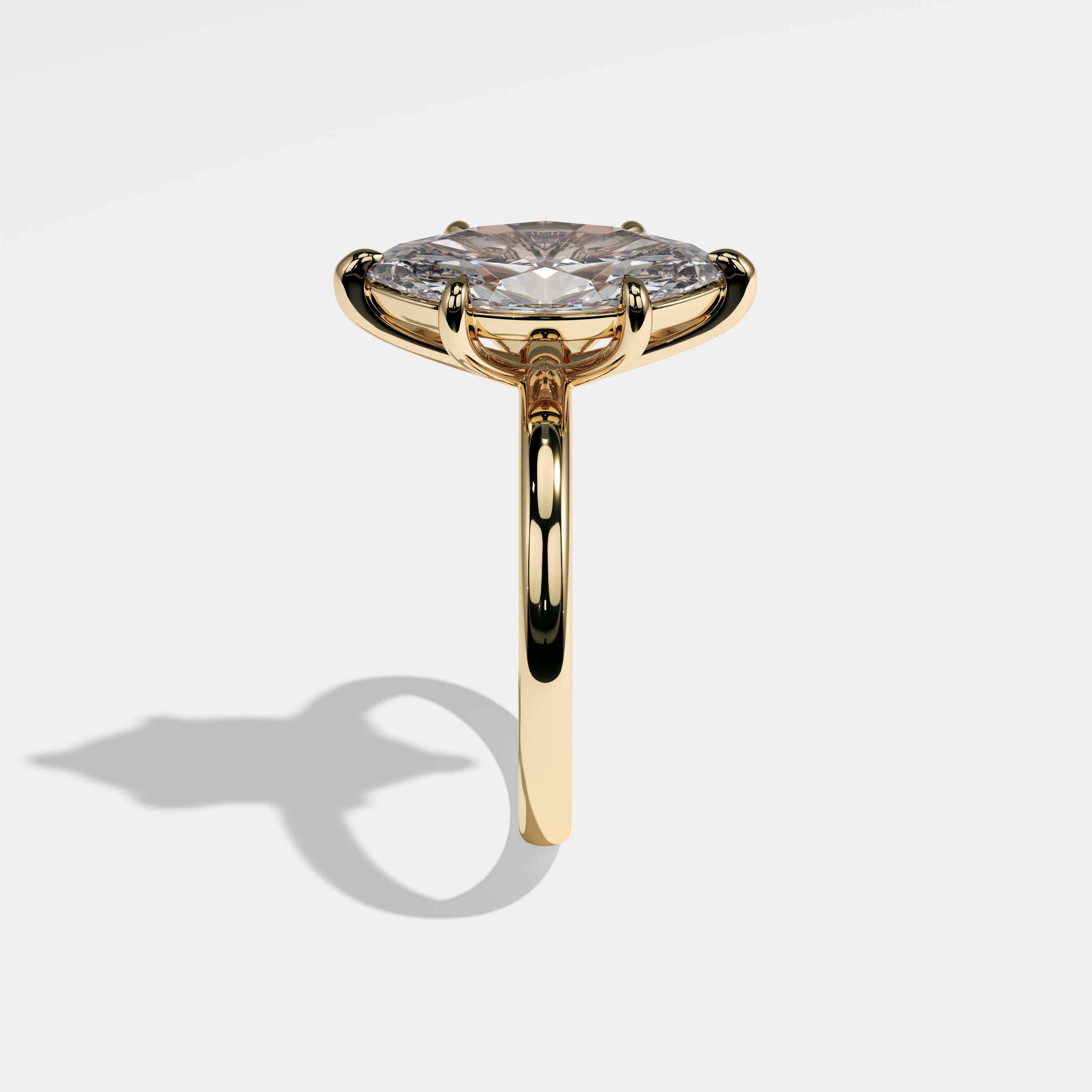 Britain marquise diamond engagement ring in 18K yellow gold by Kurbãni Durjini, side view