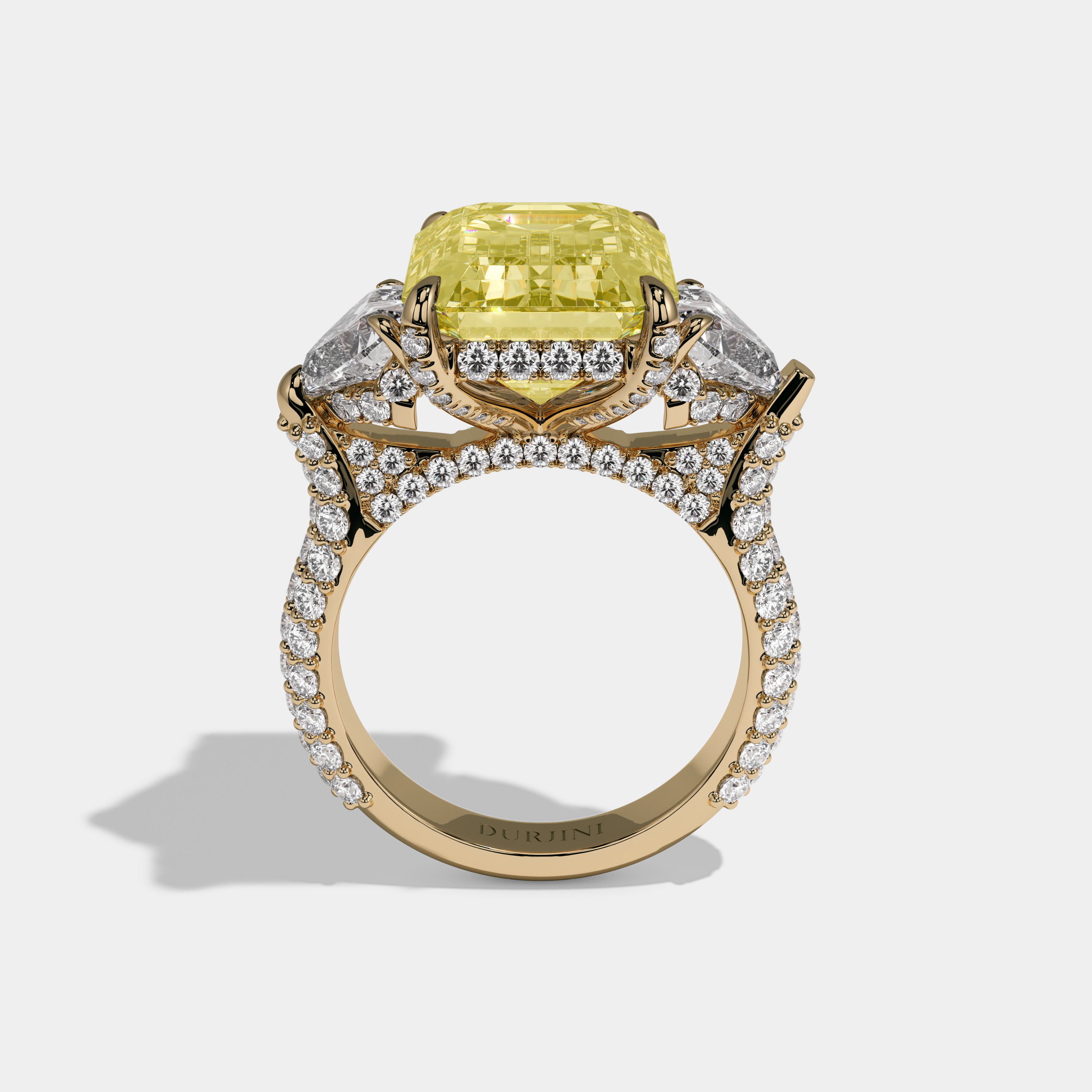 Elizabeth Fancy Yellow Emerald Cut Diamond Halo With Brilliant Cut Heart Sides Engagement Ring 10ct 18K Yellow Gold