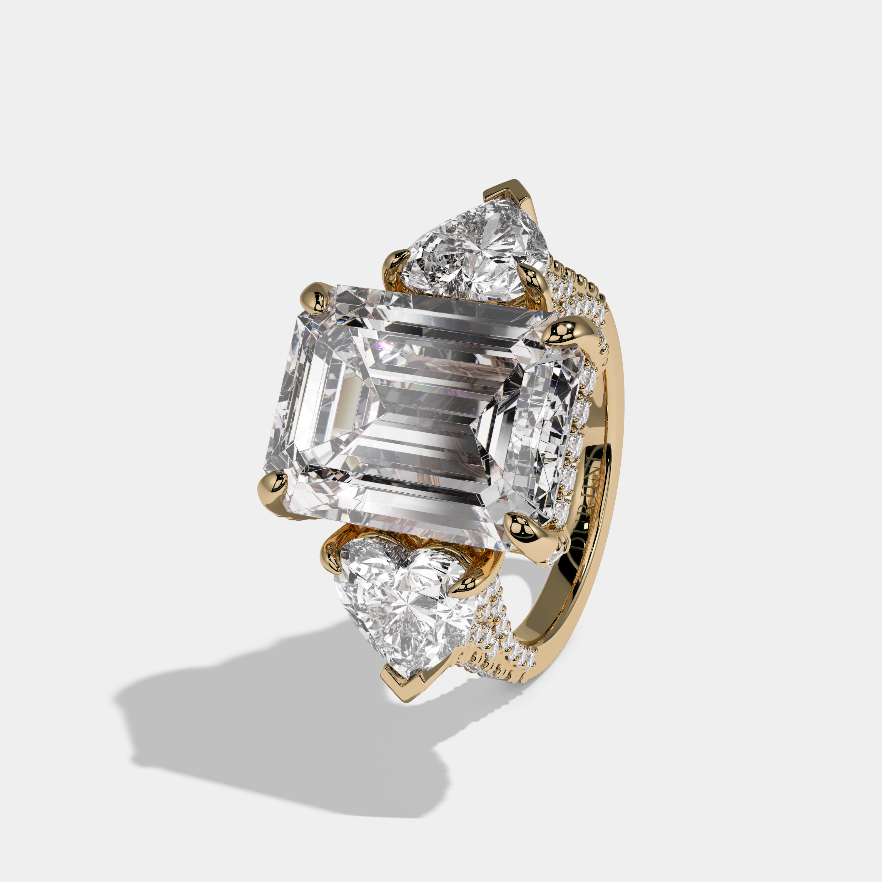 Millicent Emerald Cut Diamond Halo With Brilliant Cut Heart Side Diamond Band Engagement Ring 10ct 18K Yellow Gold