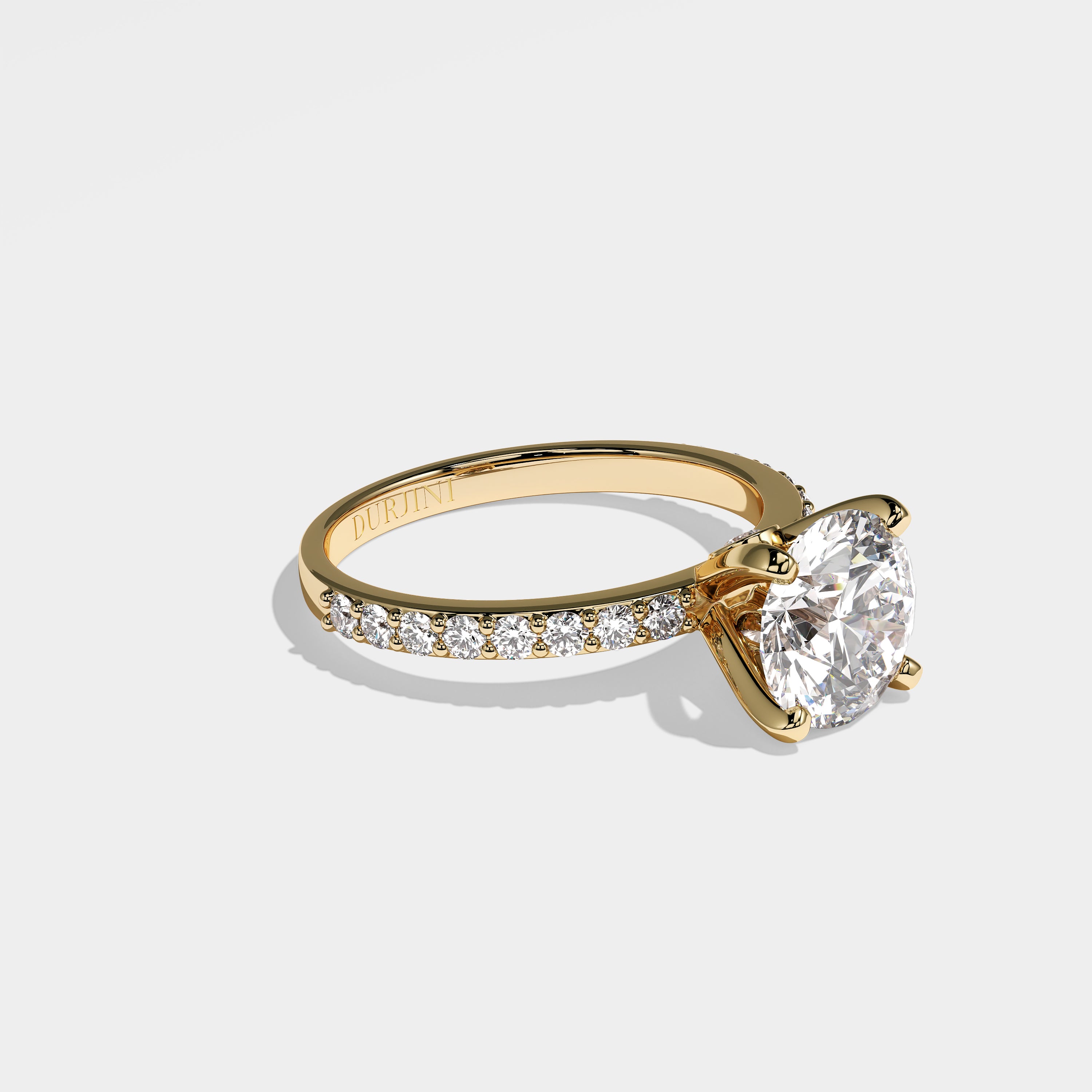 Feather round brilliant diamond engagement ring in 18K yellow gold by Kurbãni Durjini, right view