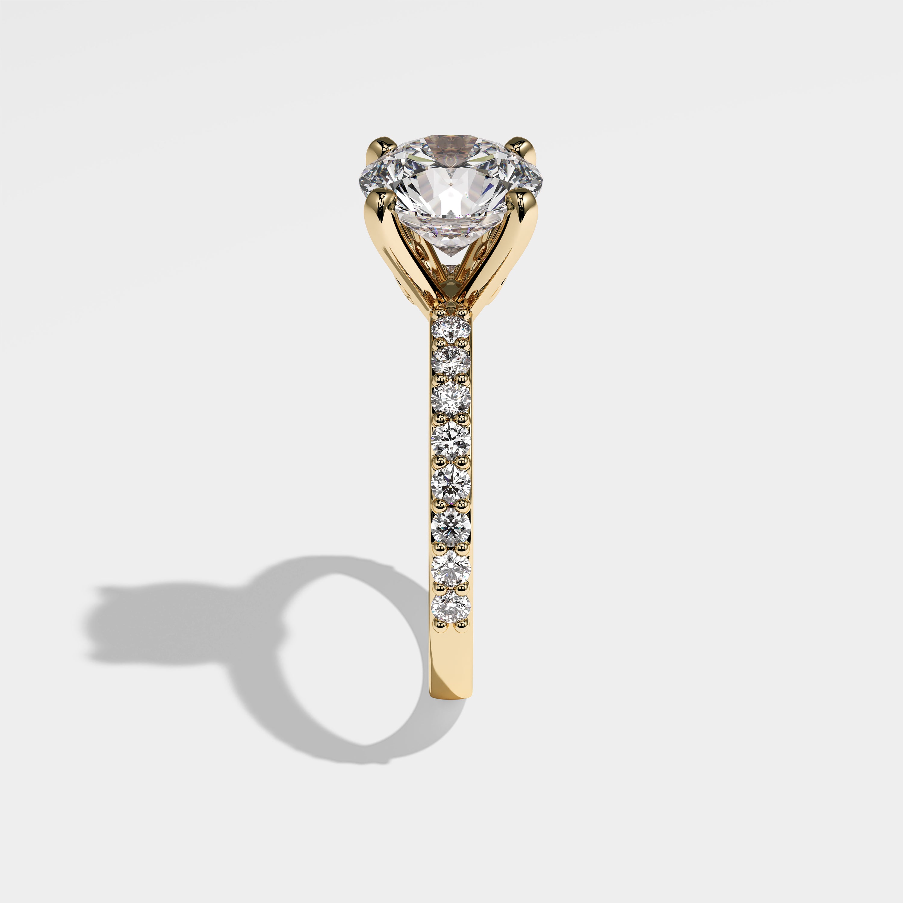 Feather round brilliant diamond engagement ring in 18K yellow gold by Kurbãni Durjini, side view
