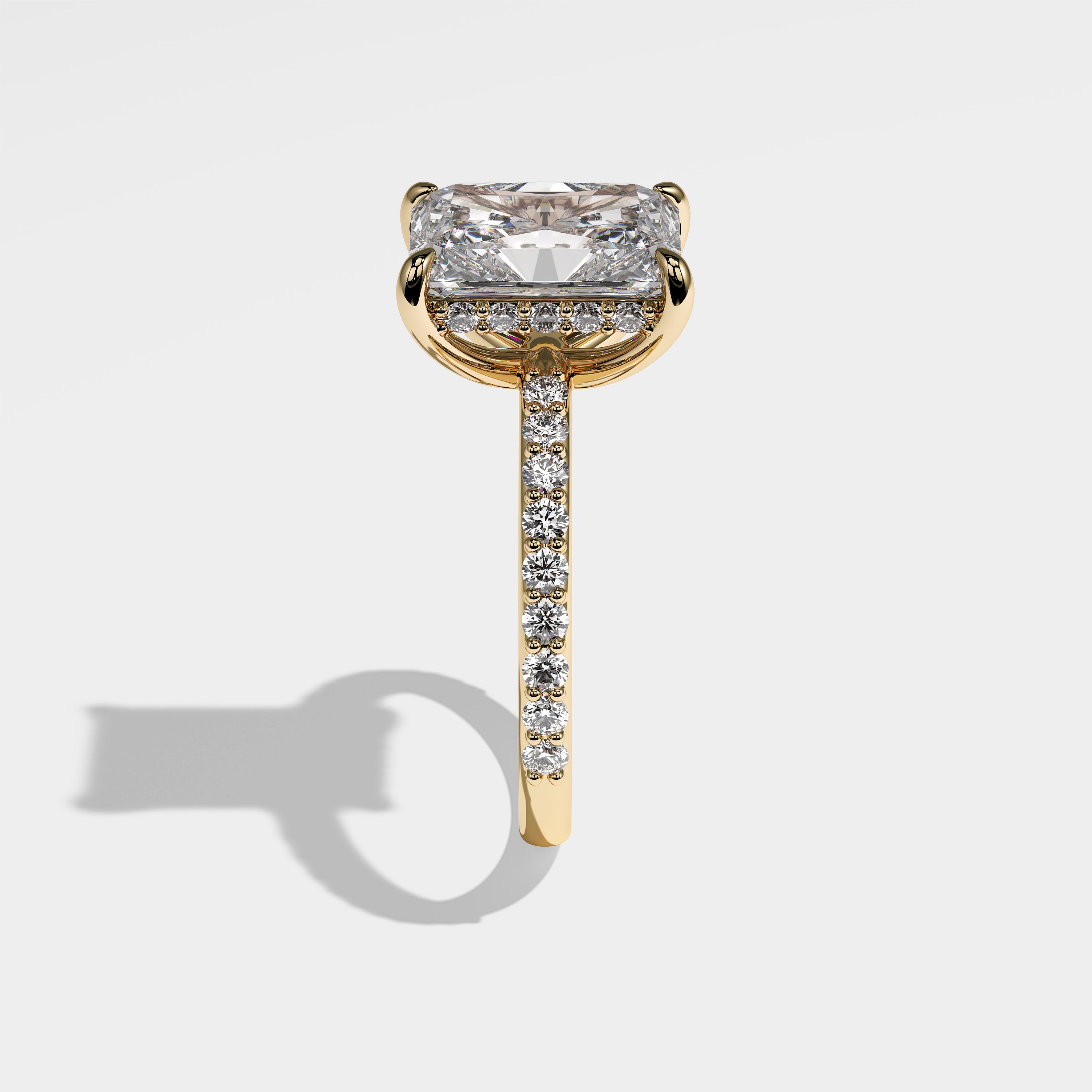 Aseela radiant halo diamond engagement ring in 18K yellow gold by Kurbãni Durjini, side view