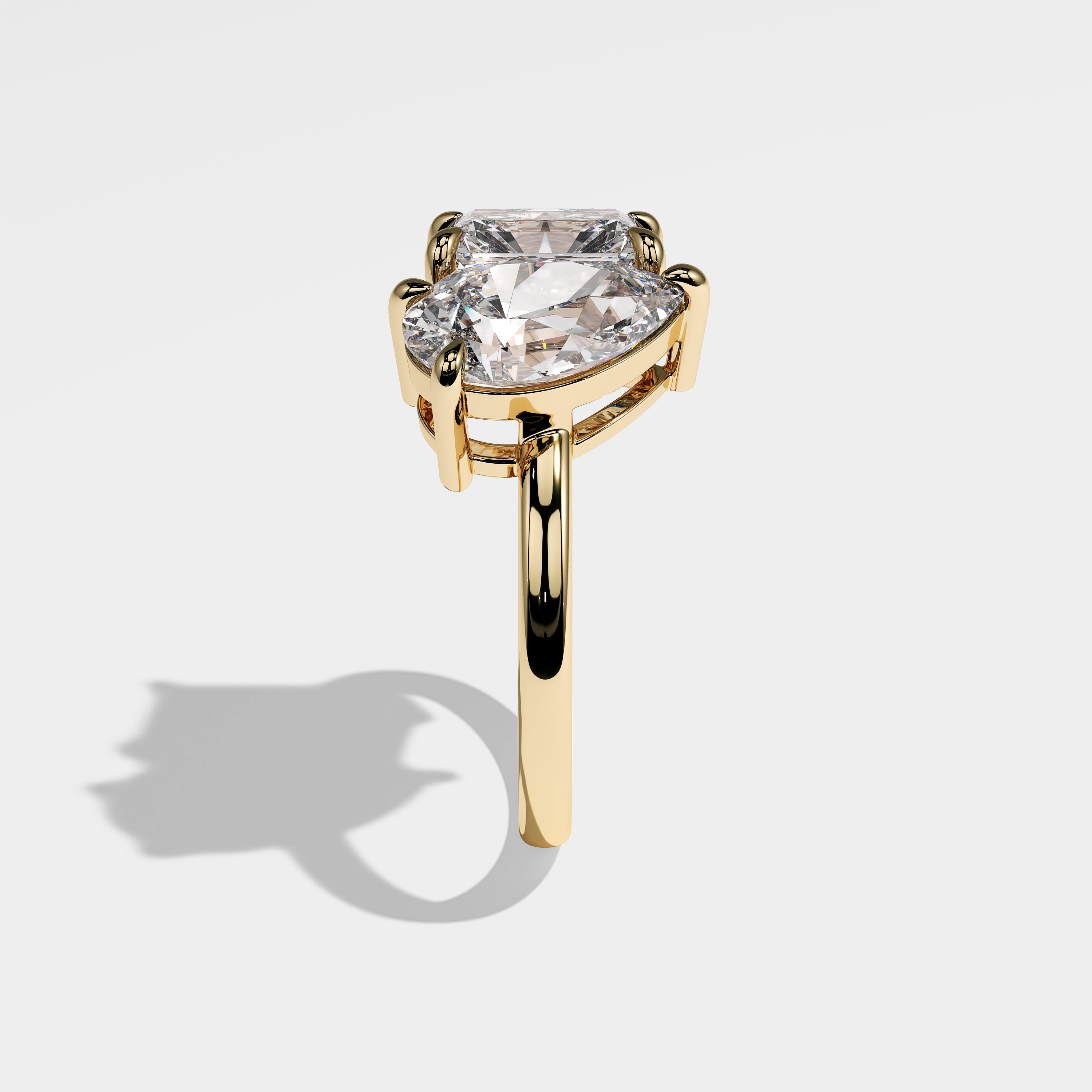 Prophecy pear diamond engagement ring in 18K yellow gold by Kurbãni Durjini, side view