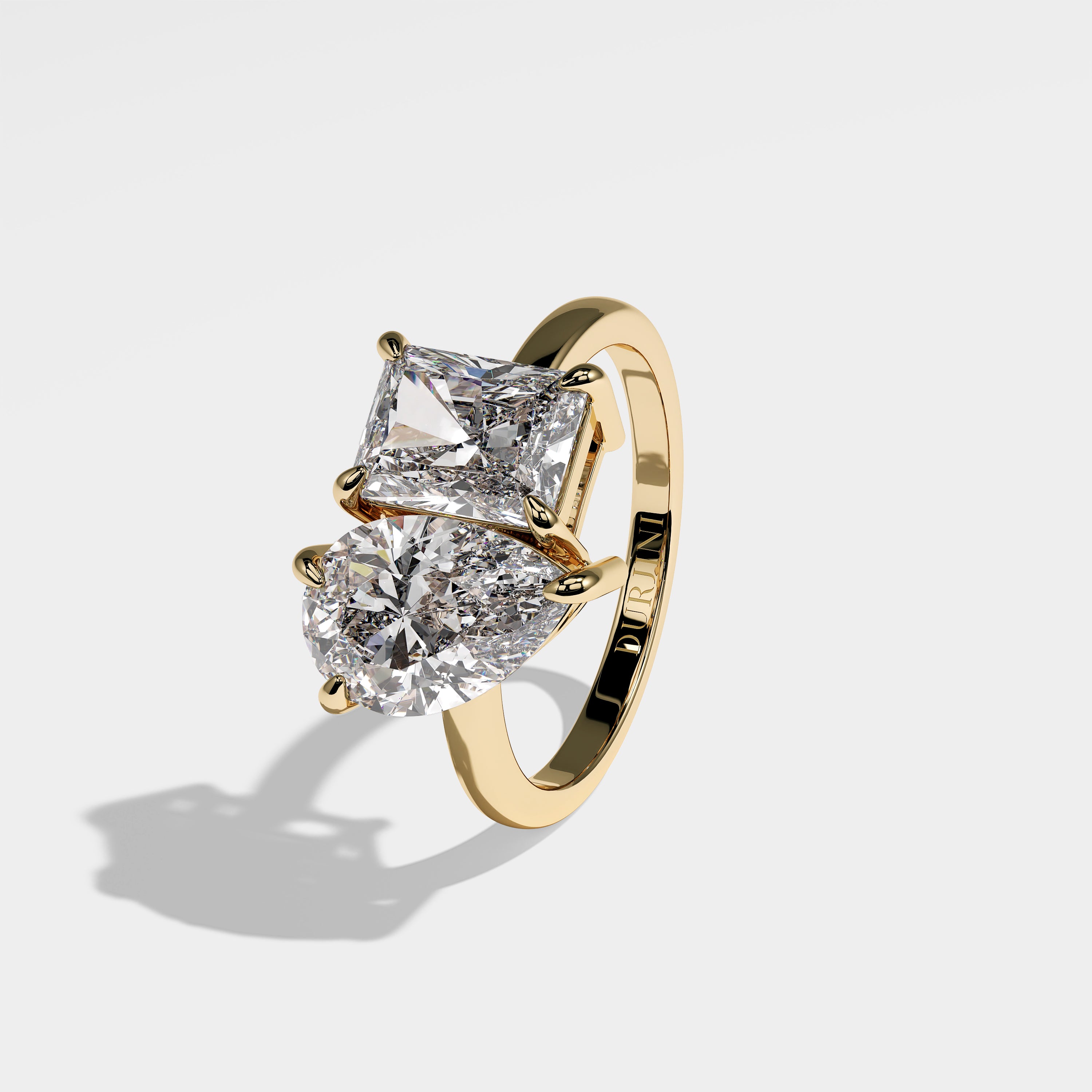 Prophecy pear diamond engagement ring in 18K yellow gold by Kurbãni Durjini, left view