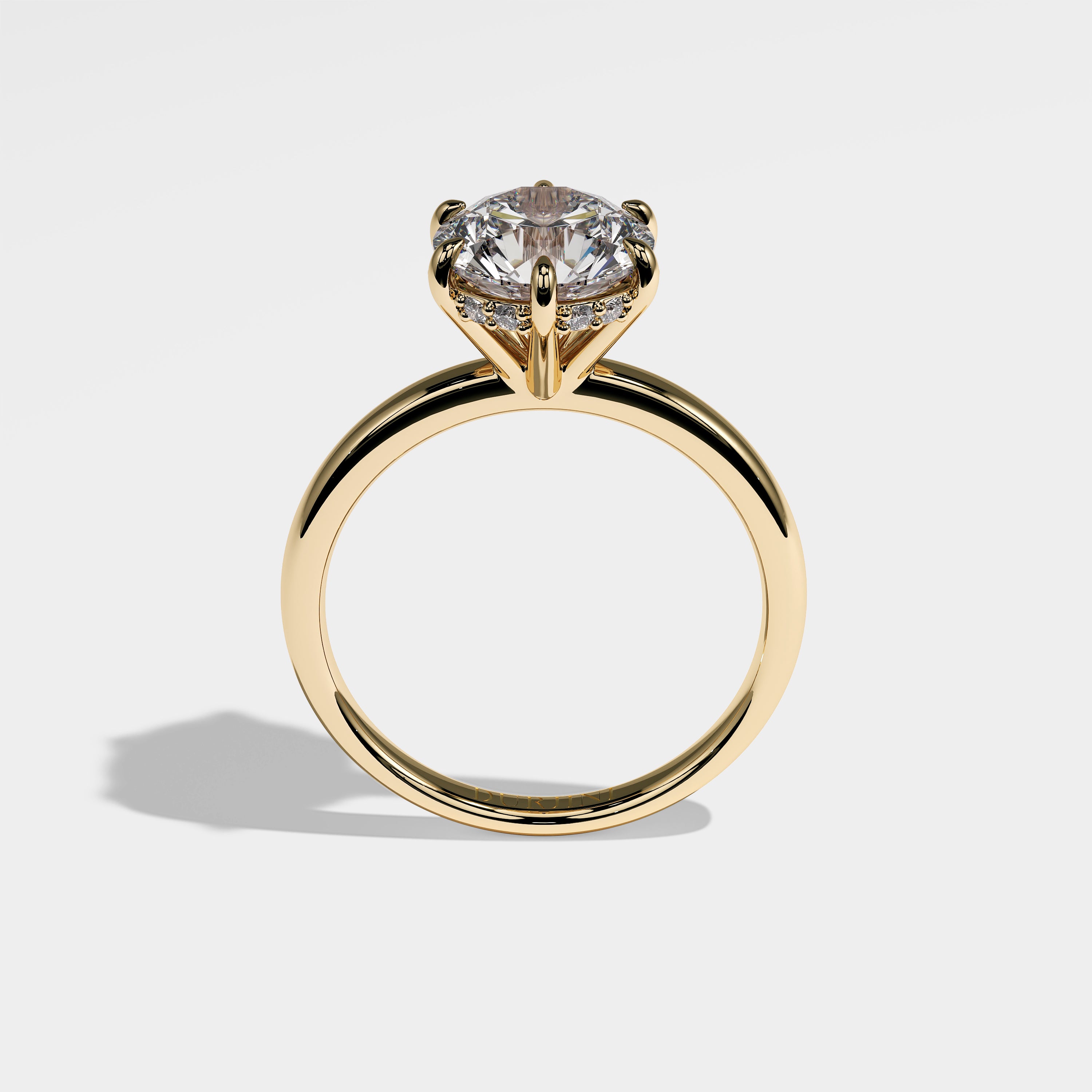 Green round brilliant diamond engagement ring in 18K yellow gold by Kurbãni Durjini, full view