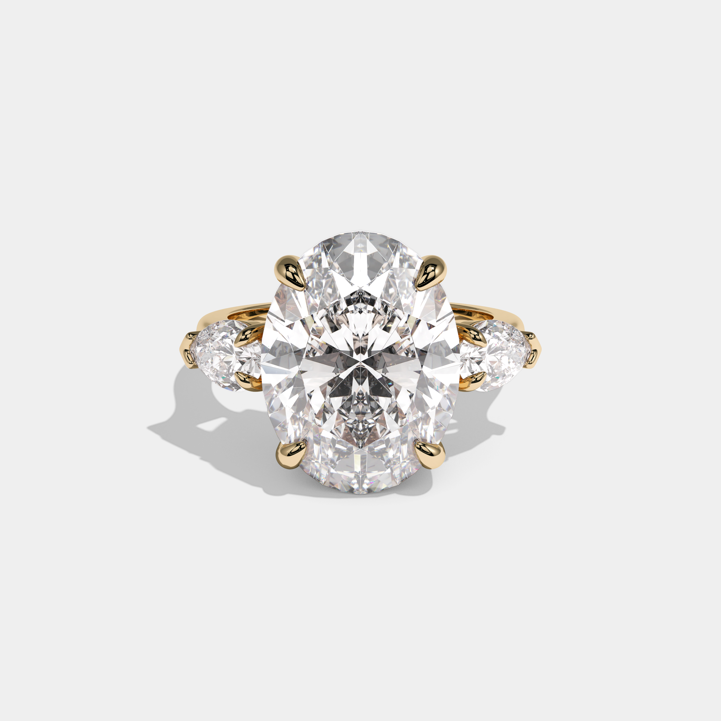 Victoria Oval Cut Diamond with Pear Cut Sides Plain Band Engagement Ring 10ct 18k Yellow Gold