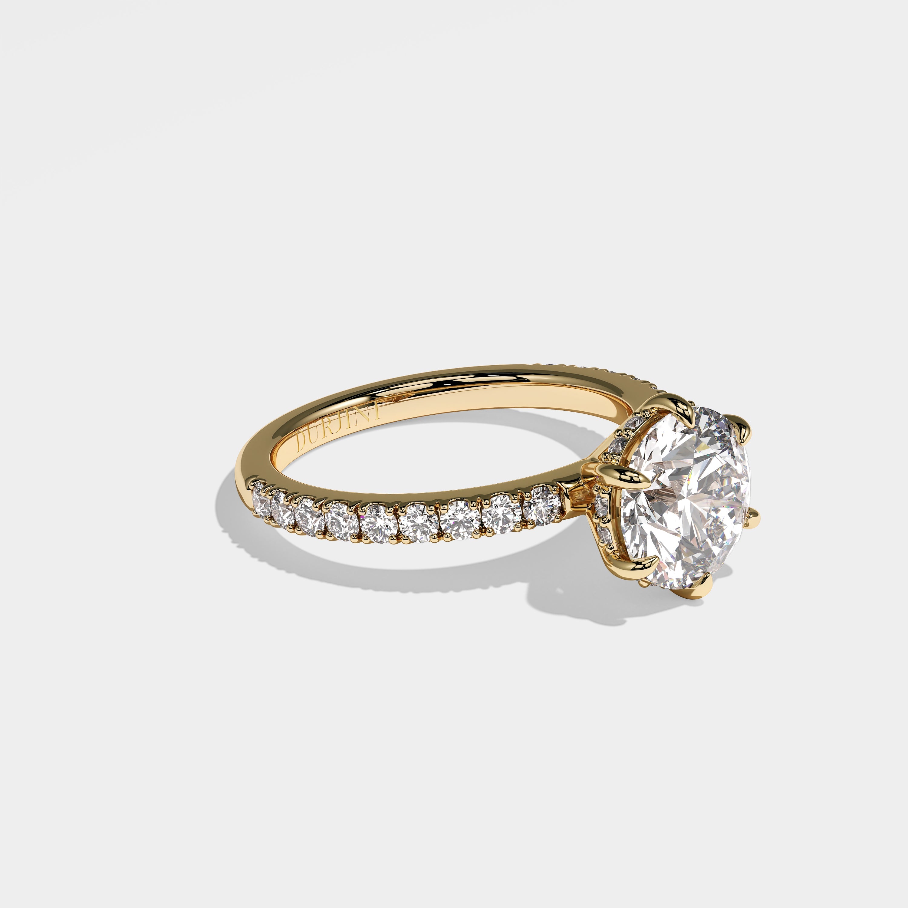 Starlight round brilliant halo diamond engagement ring in 18K yellow gold by Kurbãni Durjini, right view