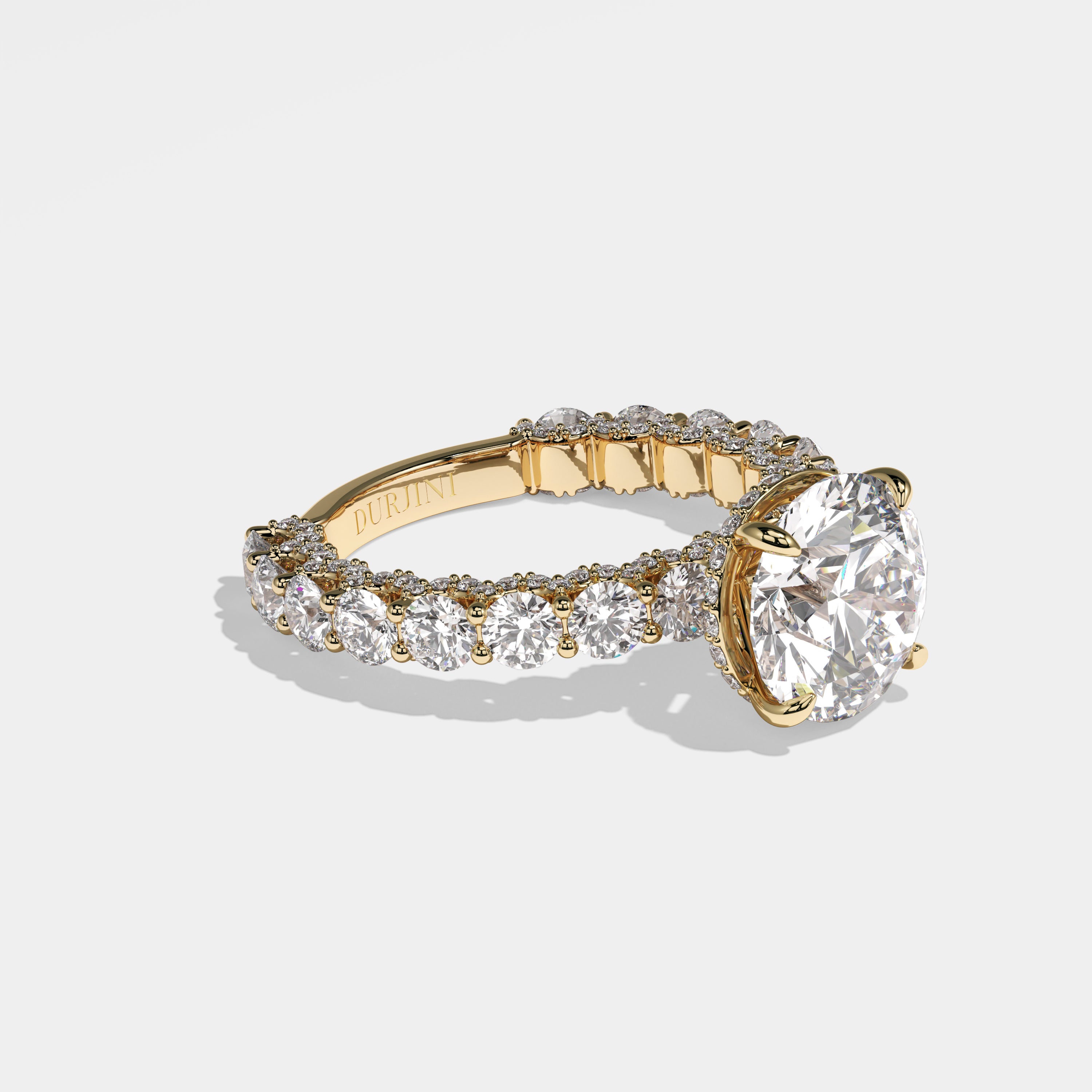 Mayor round brilliant halo diamond engagement ring in 18K yellow gold by Kurbãni Durjini, right view