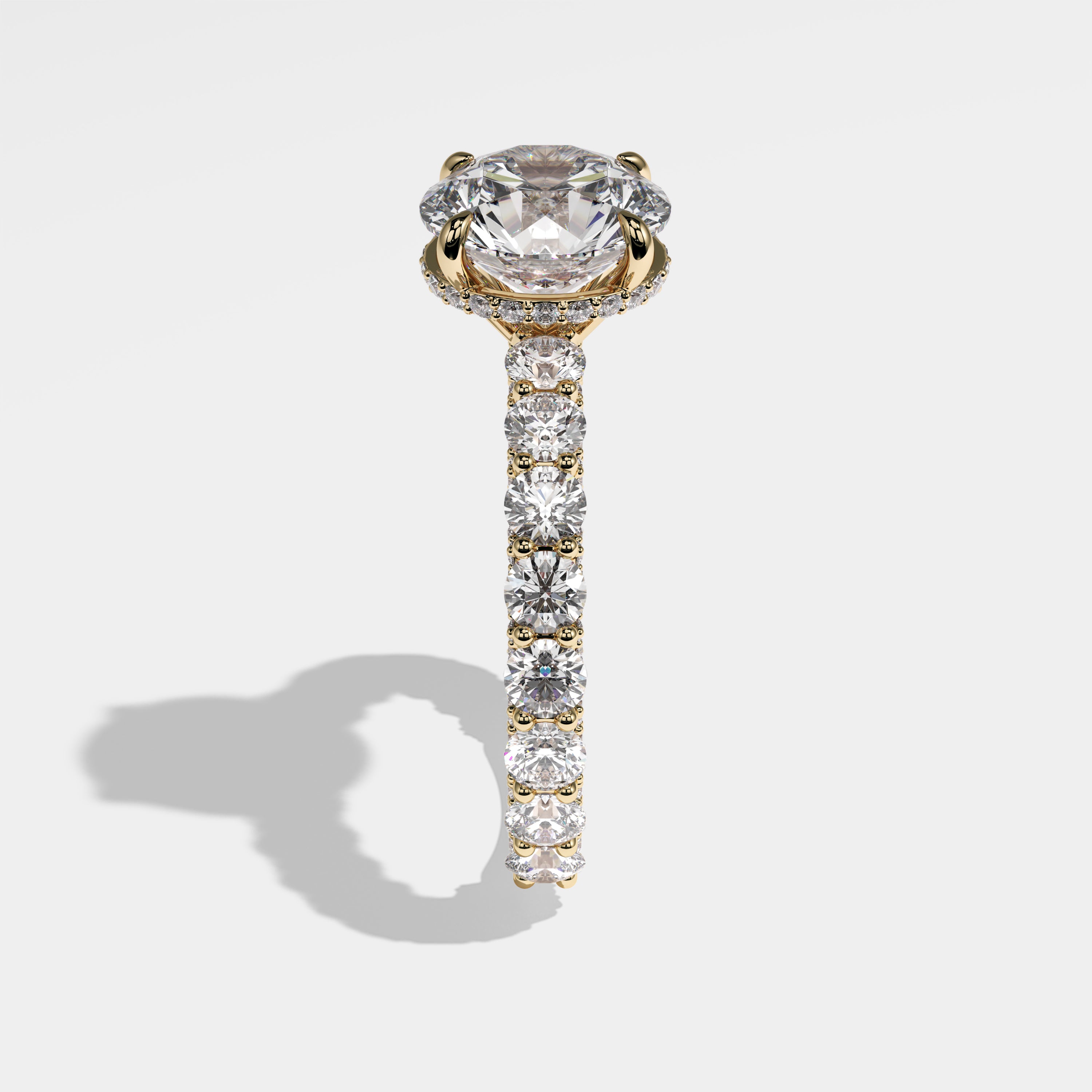 Mayor round brilliant halo diamond engagement ring in 18K yellow gold by Kurbãni Durjini, side view
