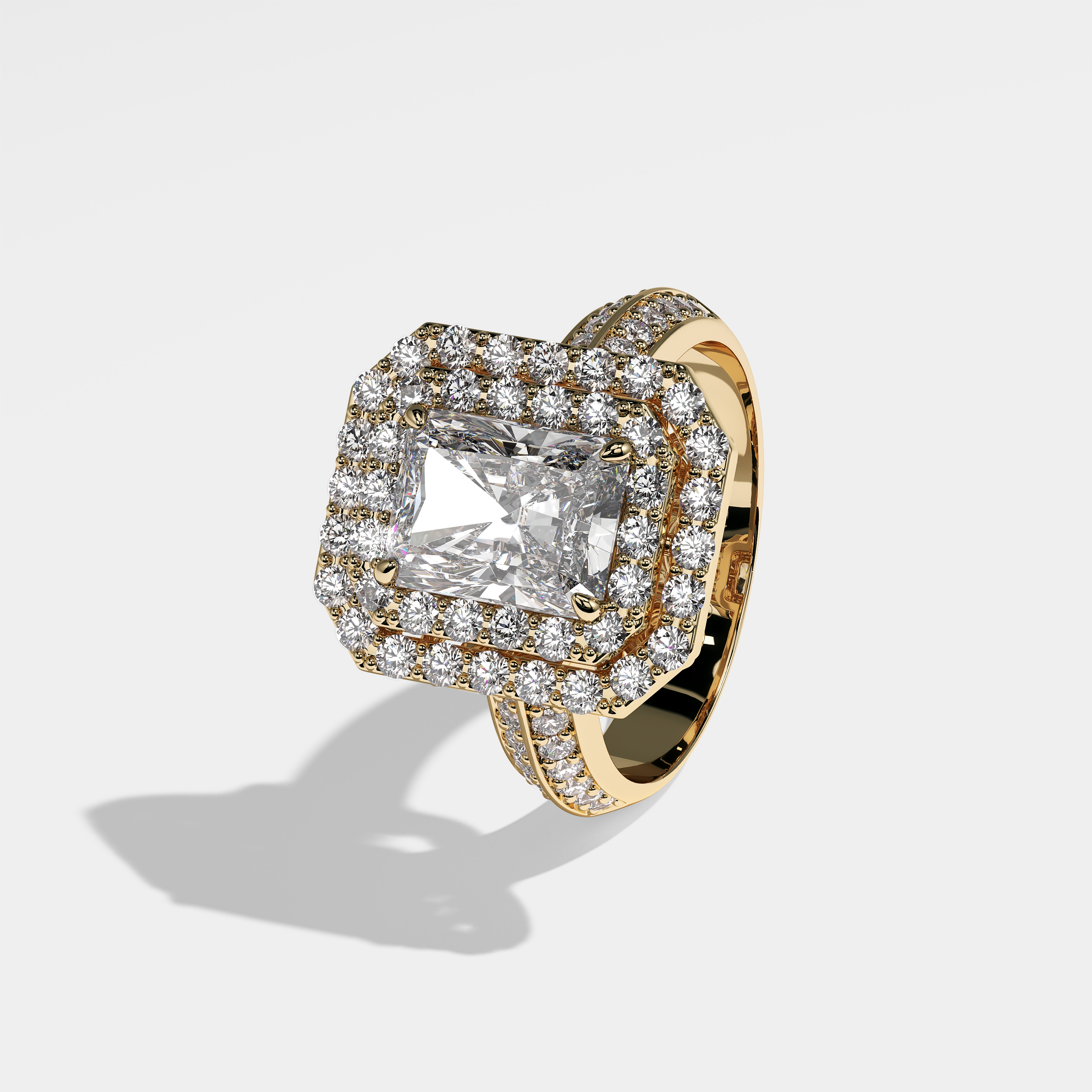 Blair radiant halo diamond engagement ring in 18K yellow gold by Kurbãni Durjini, left view