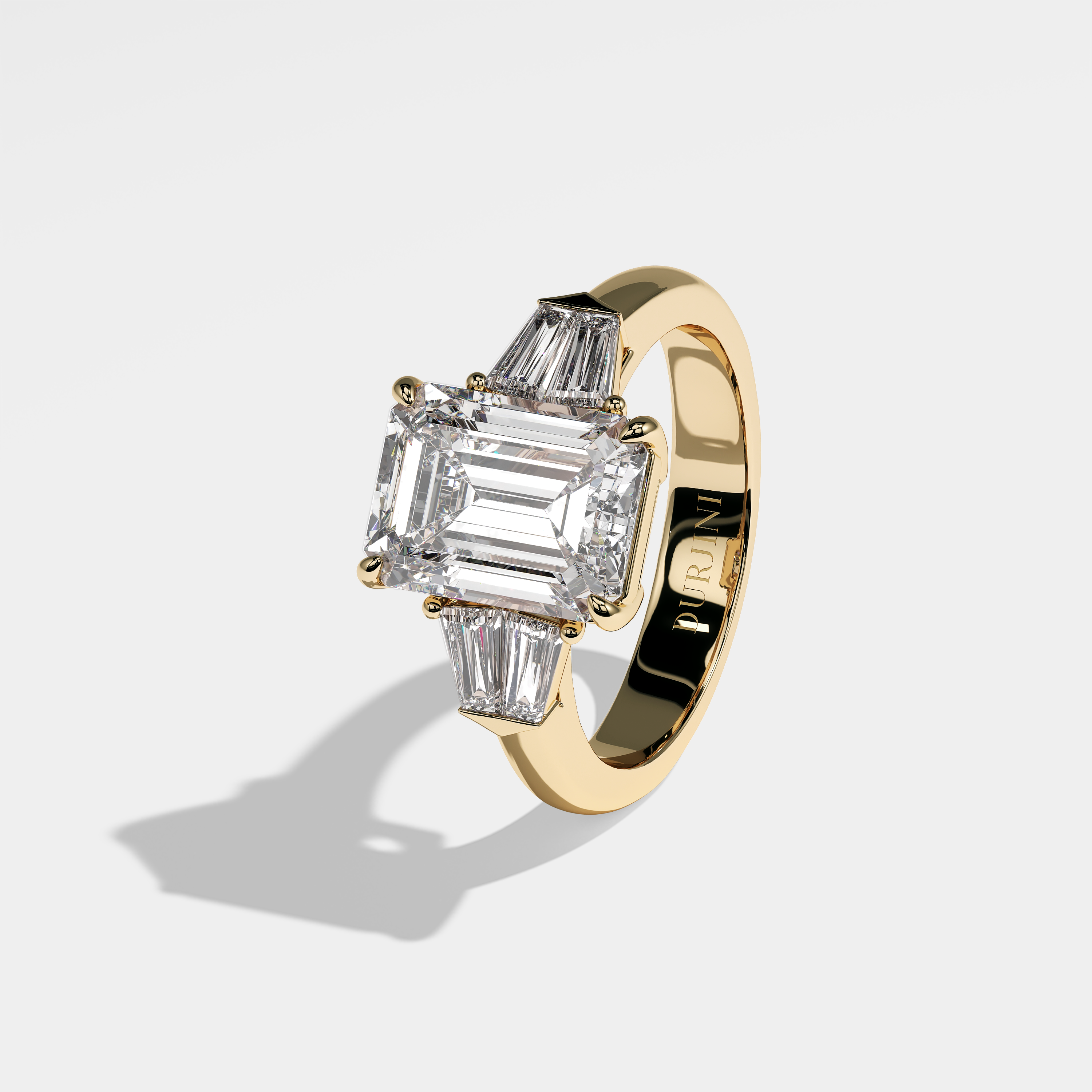 Tiana emerald diamond engagement ring in 18K yellow gold by Kurbãni Durjini, left view