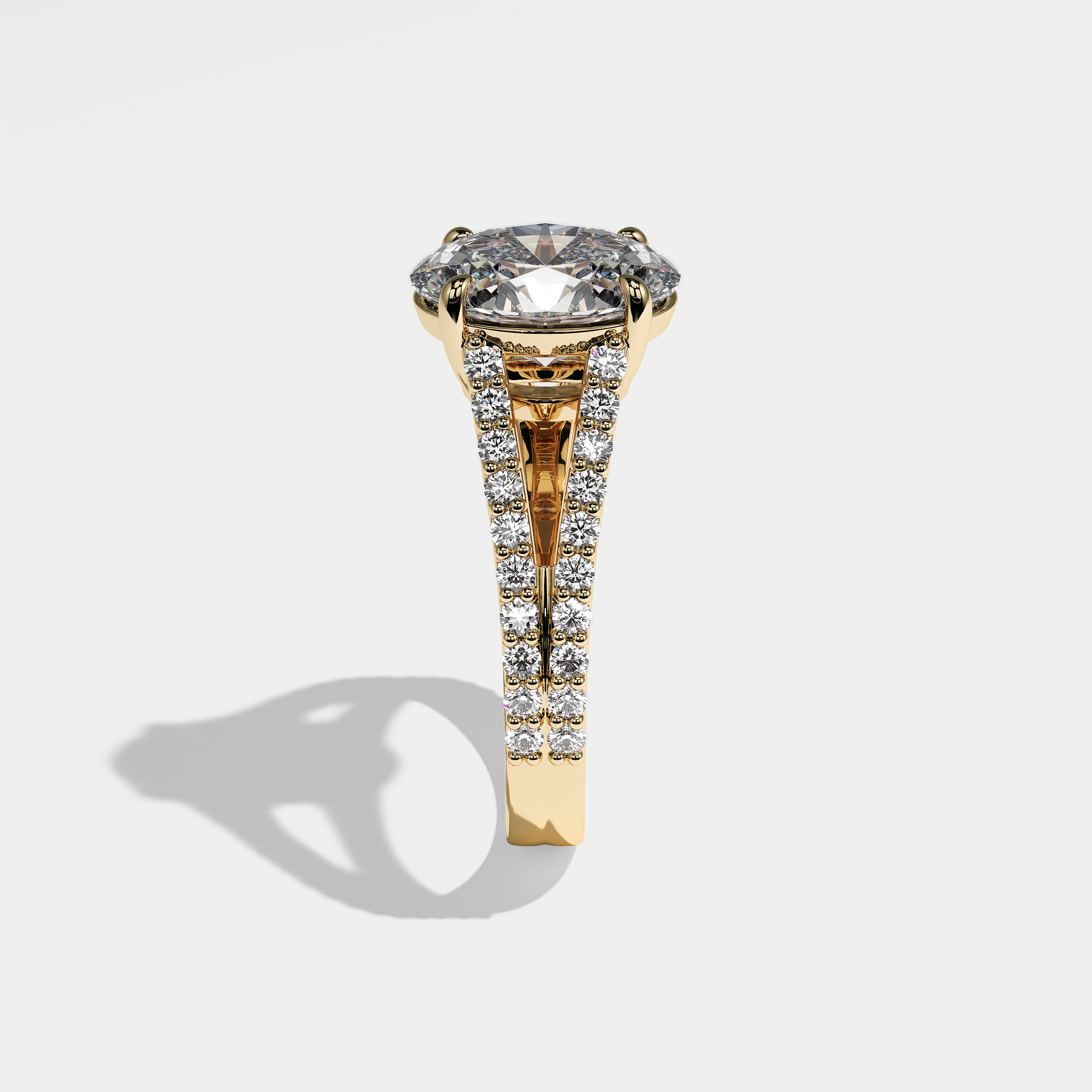 Xena oval diamond engagement ring in 18K yellow gold by Kurbãni Durjini, side view
