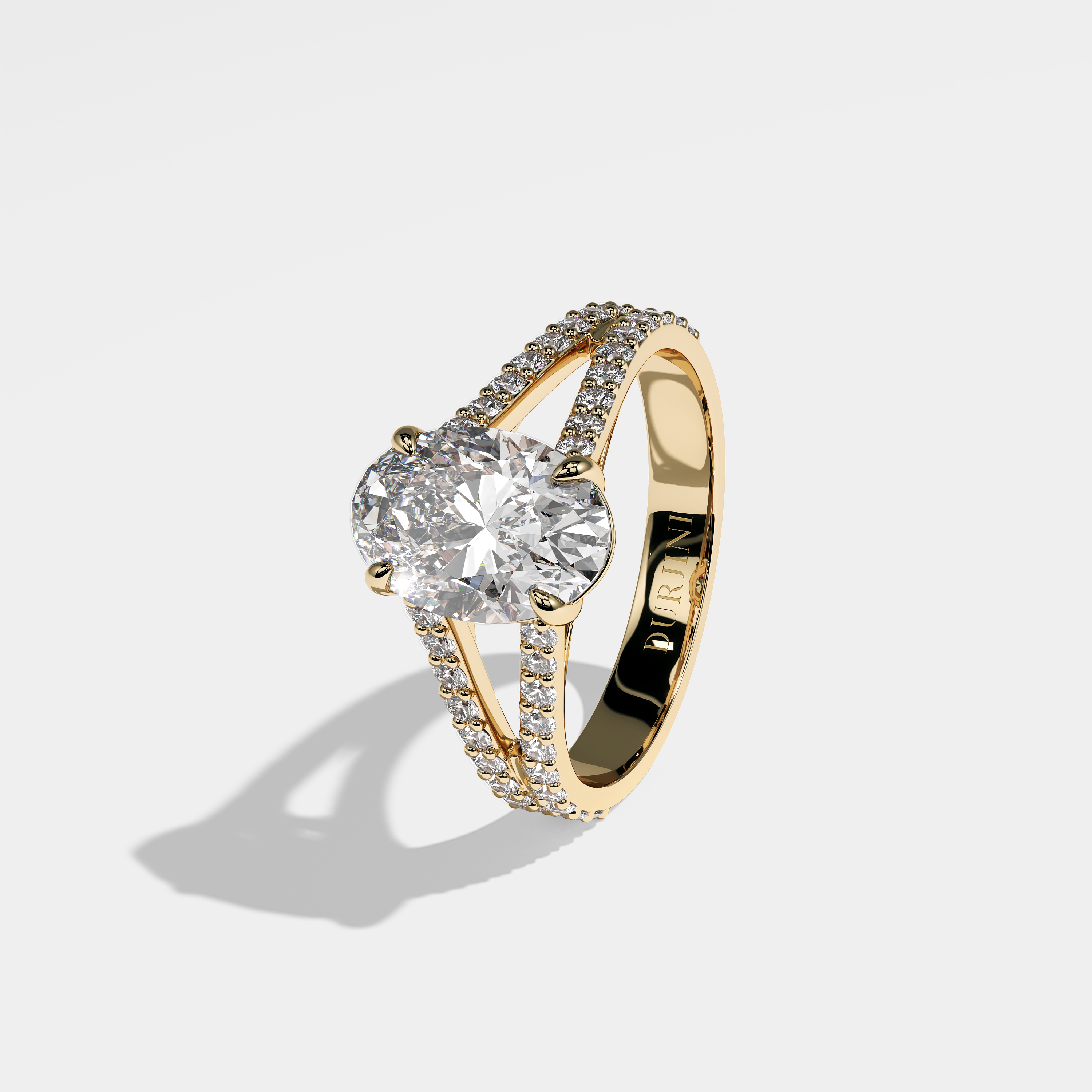 Xena oval diamond engagement ring in 18K yellow gold by Kurbãni Durjini, left view