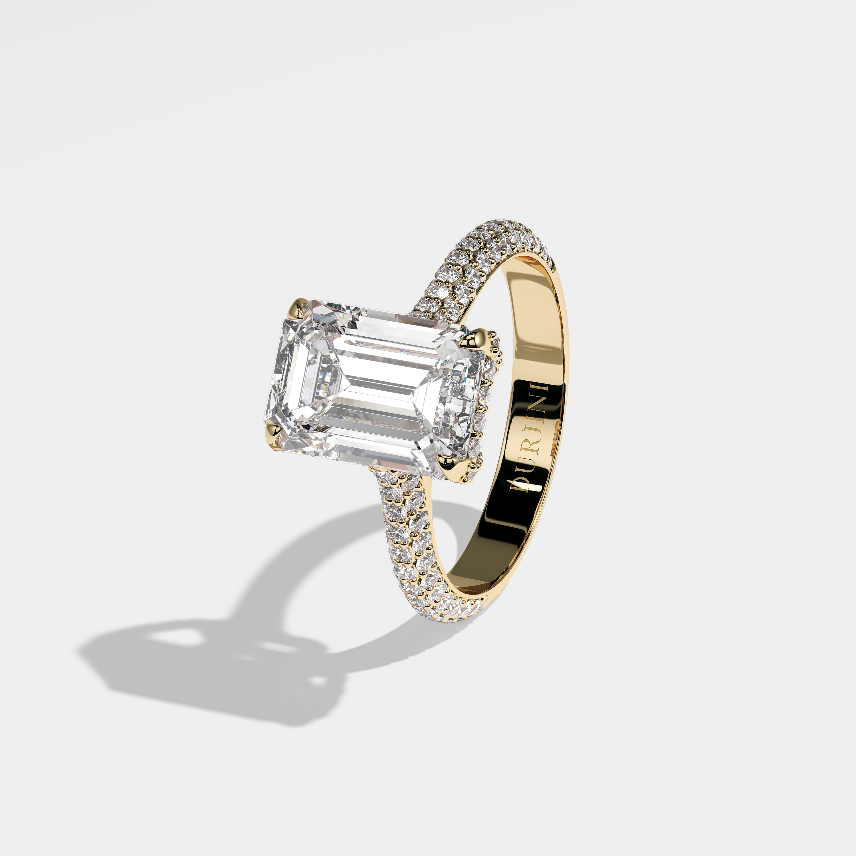 Katy emerald halo diamond engagement ring in 18K yellow gold by Kurbãni Durjini, left view