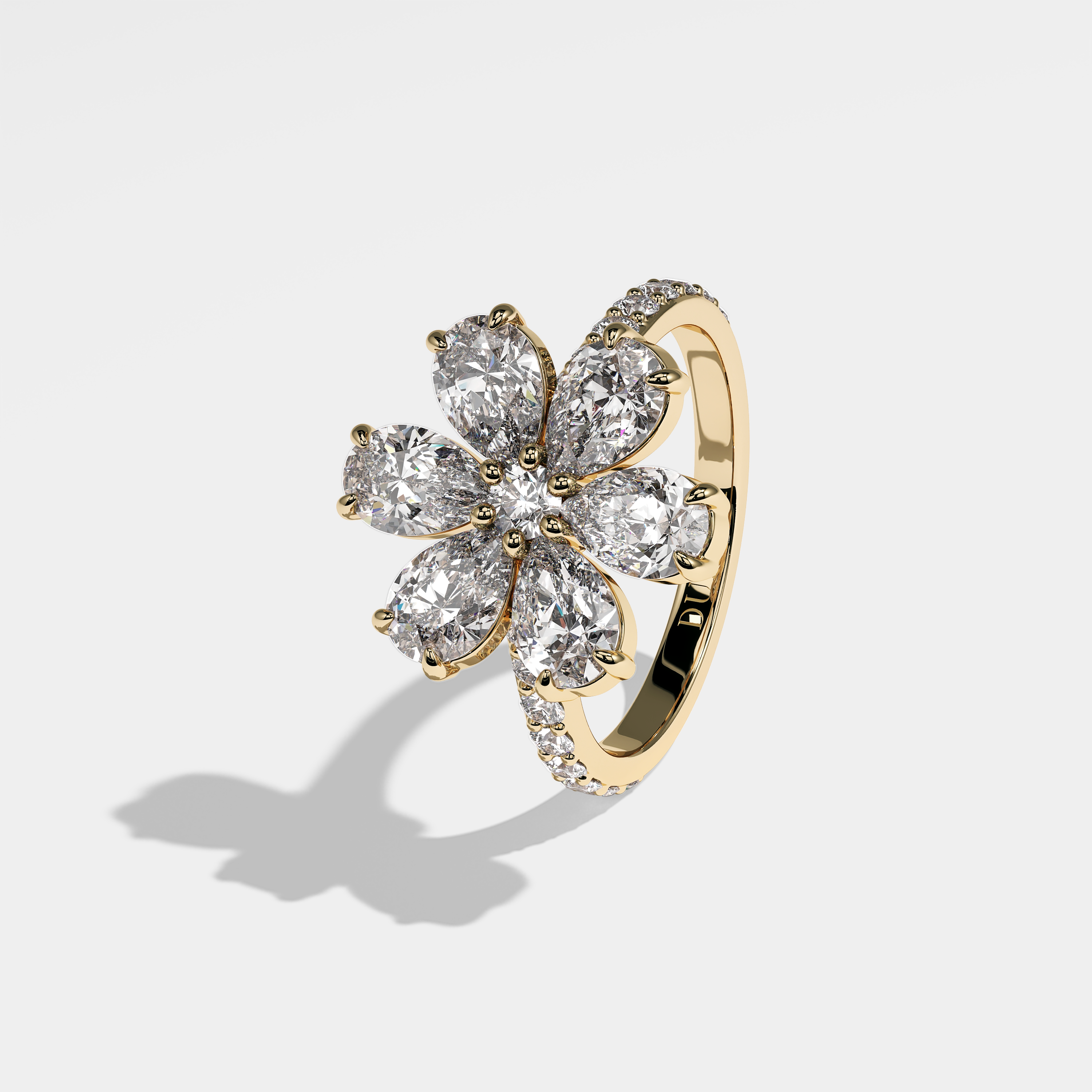 Fair pear diamond engagement ring in 18K yellow gold by Kurbãni Durjini, left view