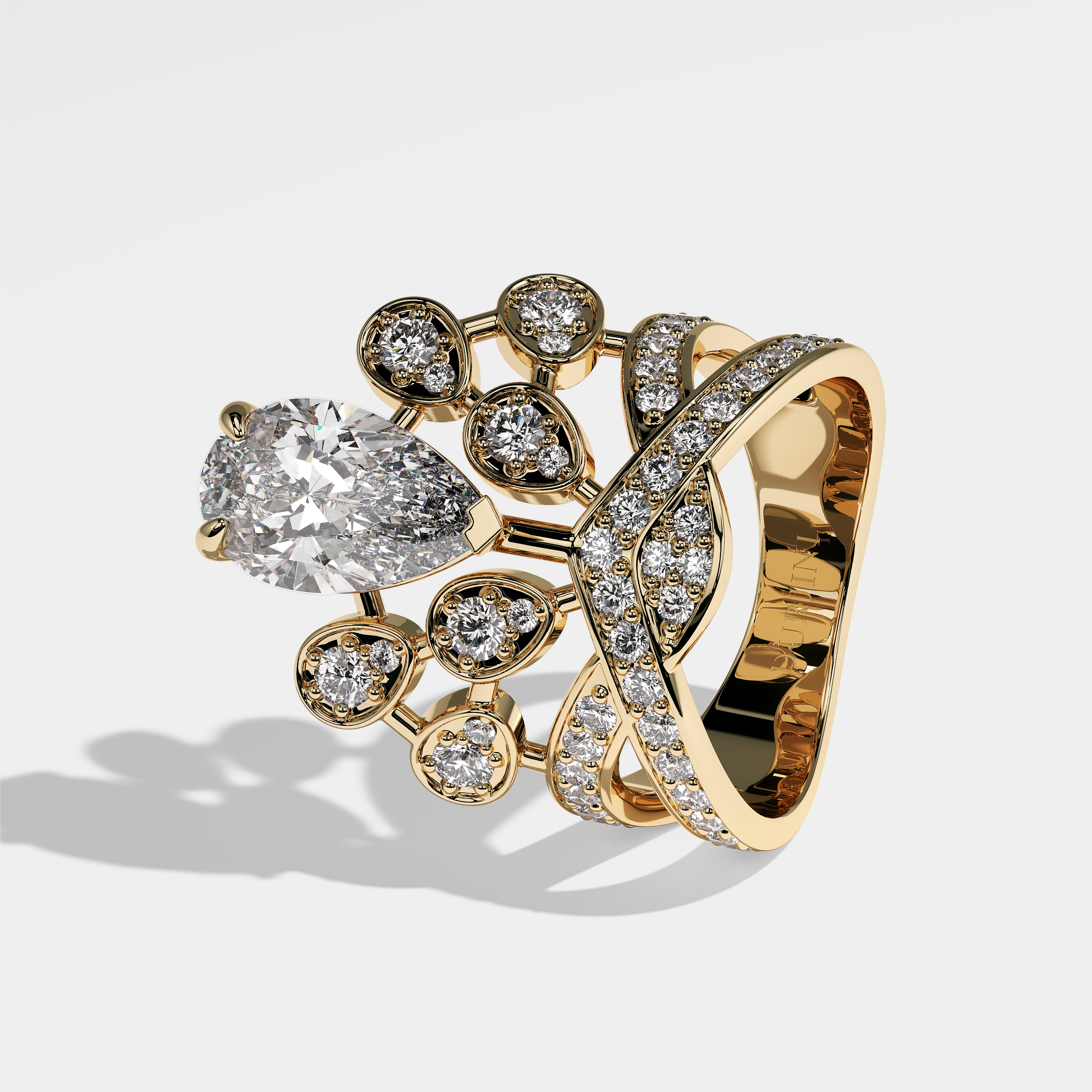 Grace pear diamond engagement ring in 18K yellow gold by Kurbãni Durjini, left view