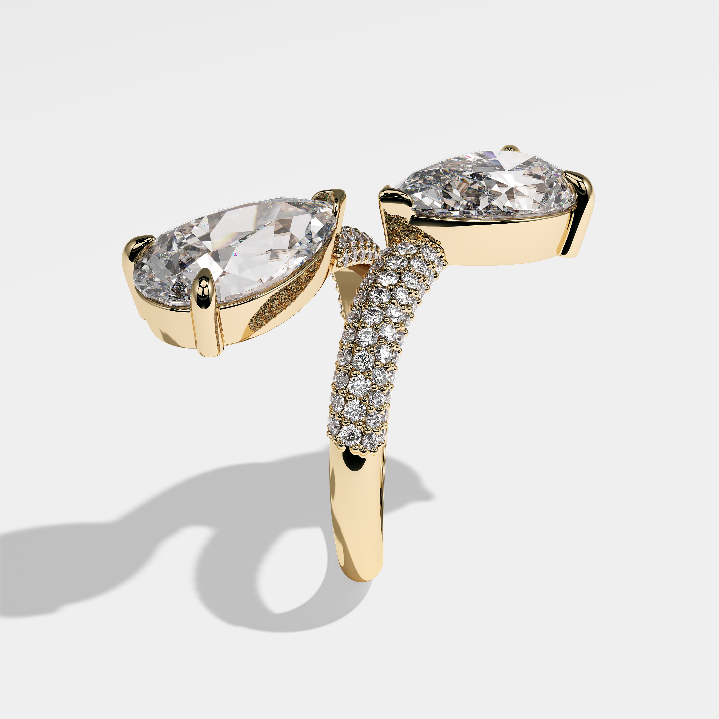 Millicent pear diamond engagement ring in 18K yellow gold by Kurbãni Durjini, side view