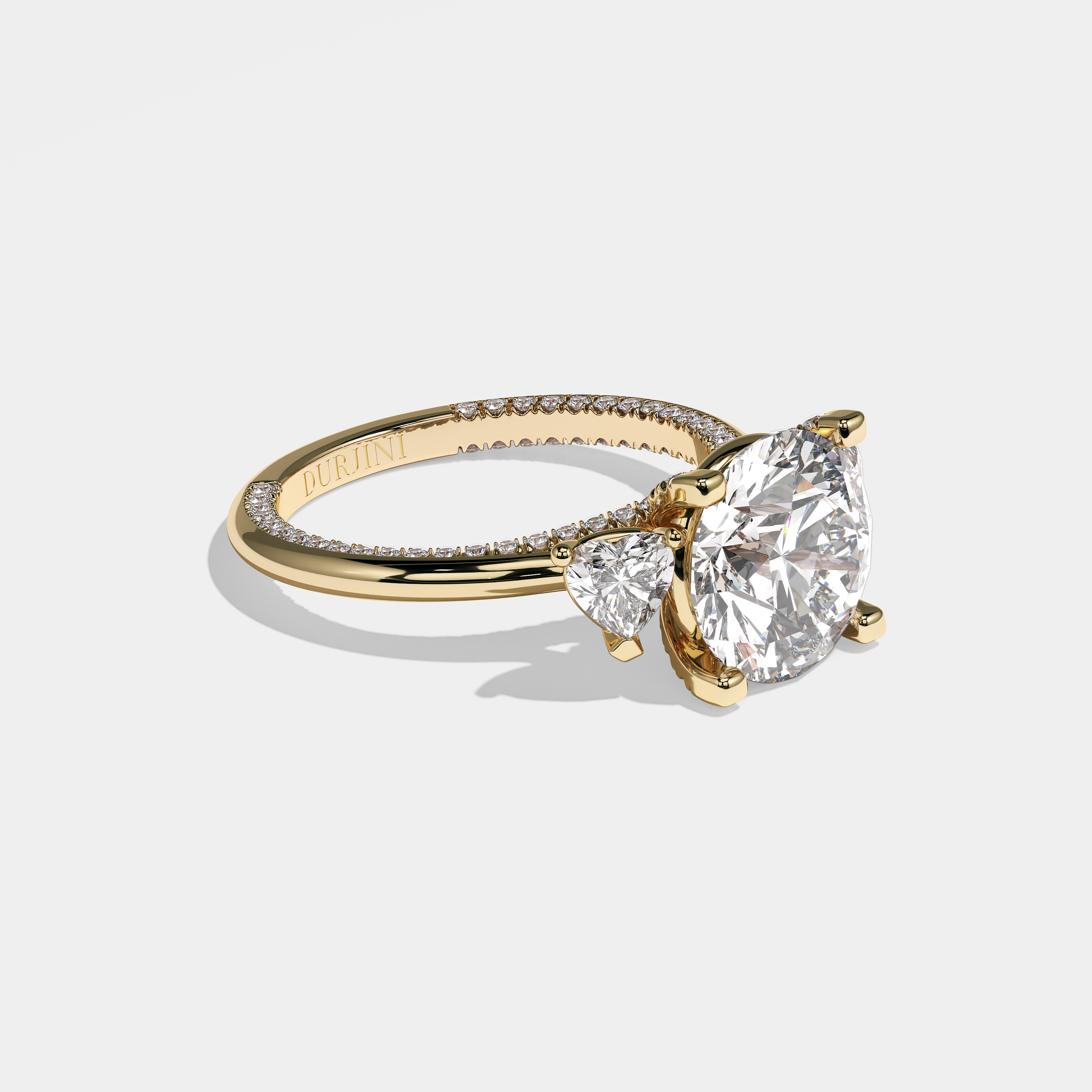 Mariana round brilliant diamond engagement ring in 18K yellow gold by Kurbãni Durjini, right view