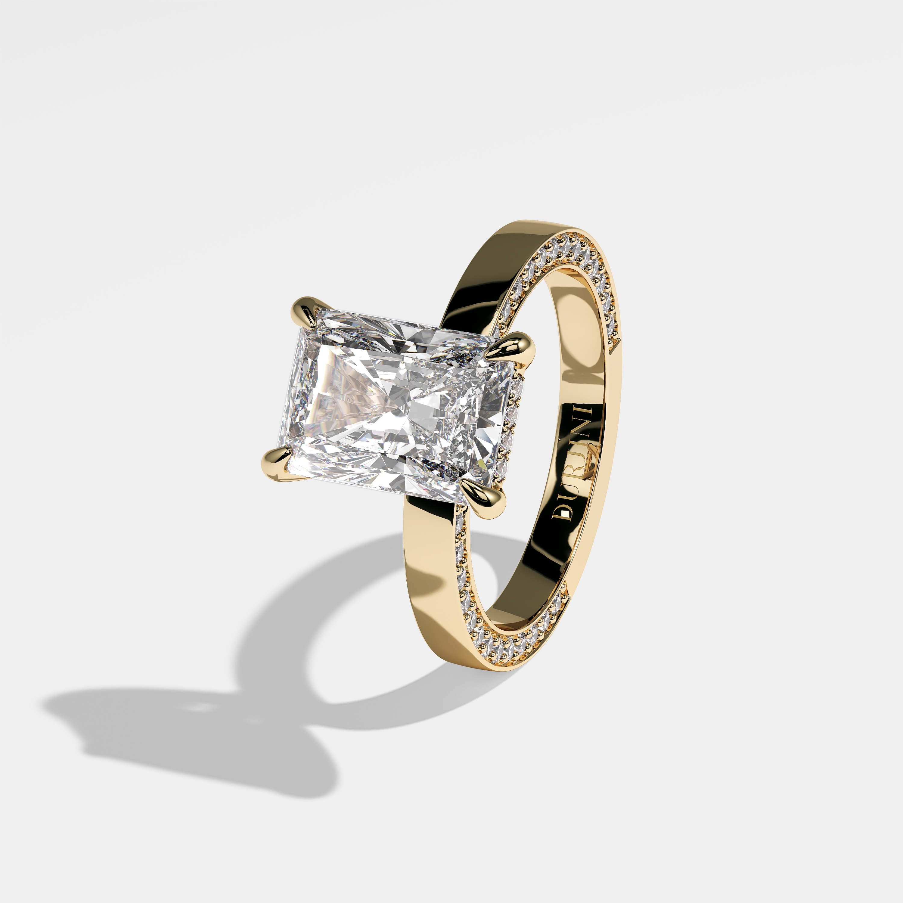 Left View – Kurbãni Durjini Macarena Diamond Radiant Engagement Ring Yellow Gold