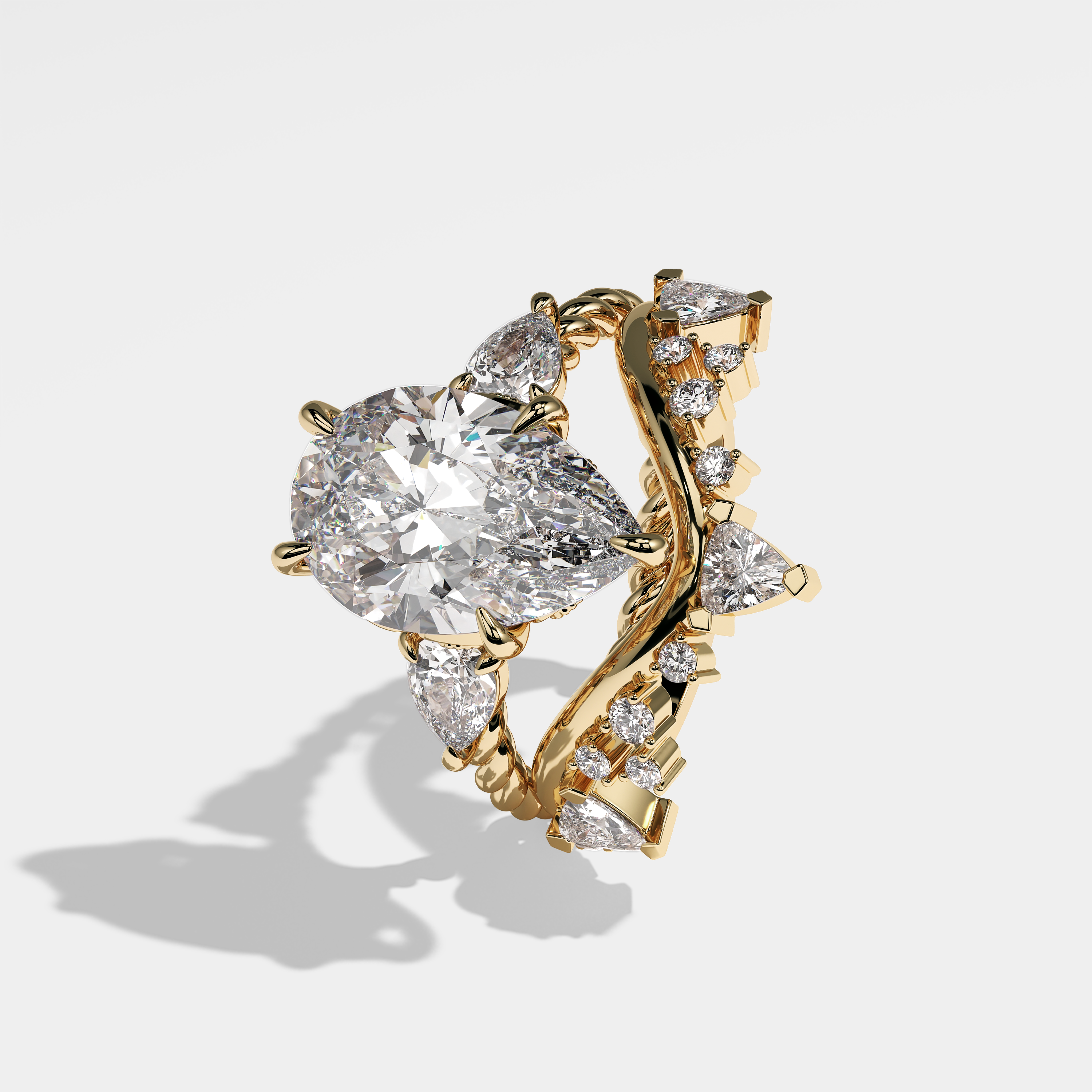 Left View – Kurbãni Durjini Mia Diamond Pear Engagement Ring Yellow Gold (Set Of 2)