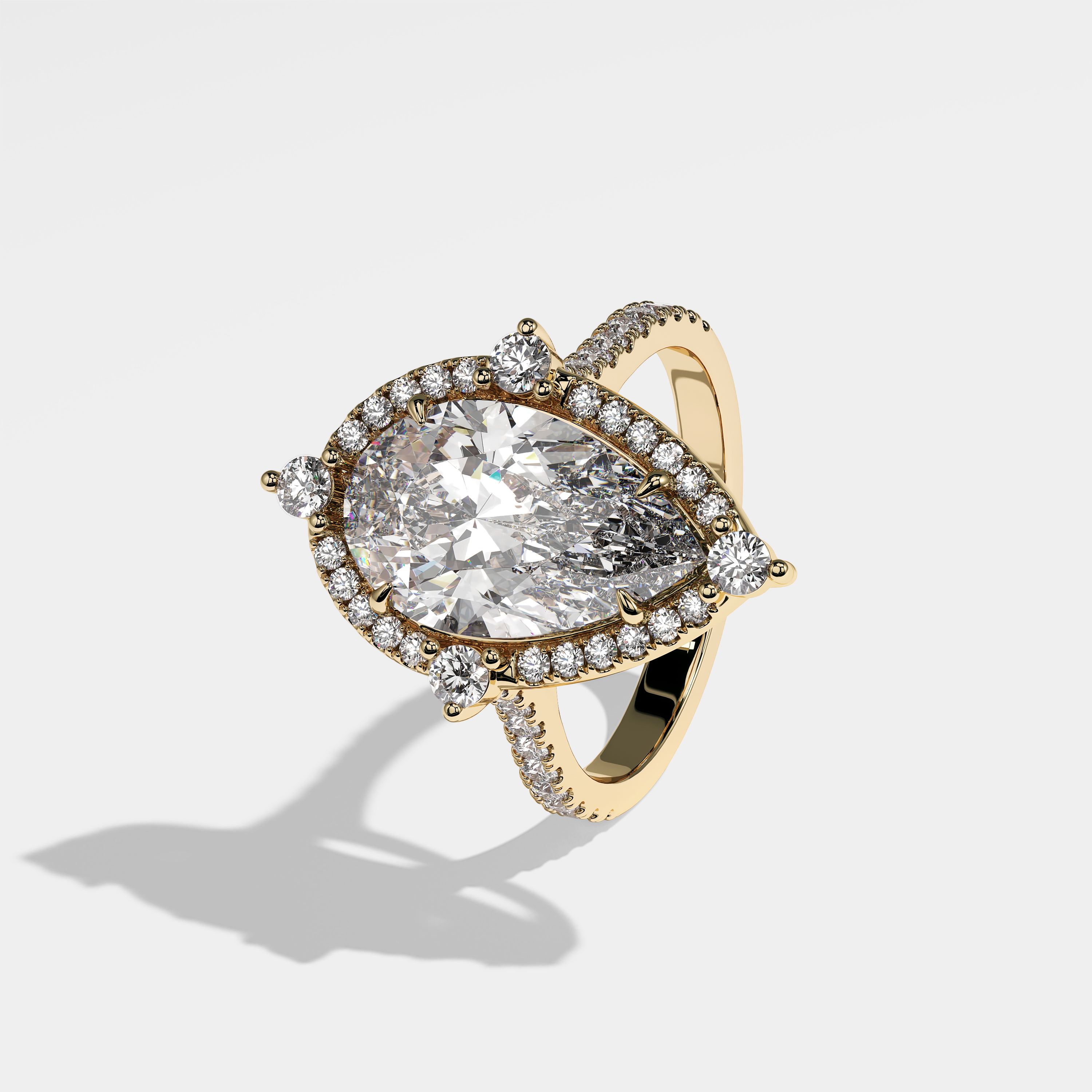 Left View – Kurbãni Durjini Mallory Diamond Pear Halo Engagement Ring Yellow Gold