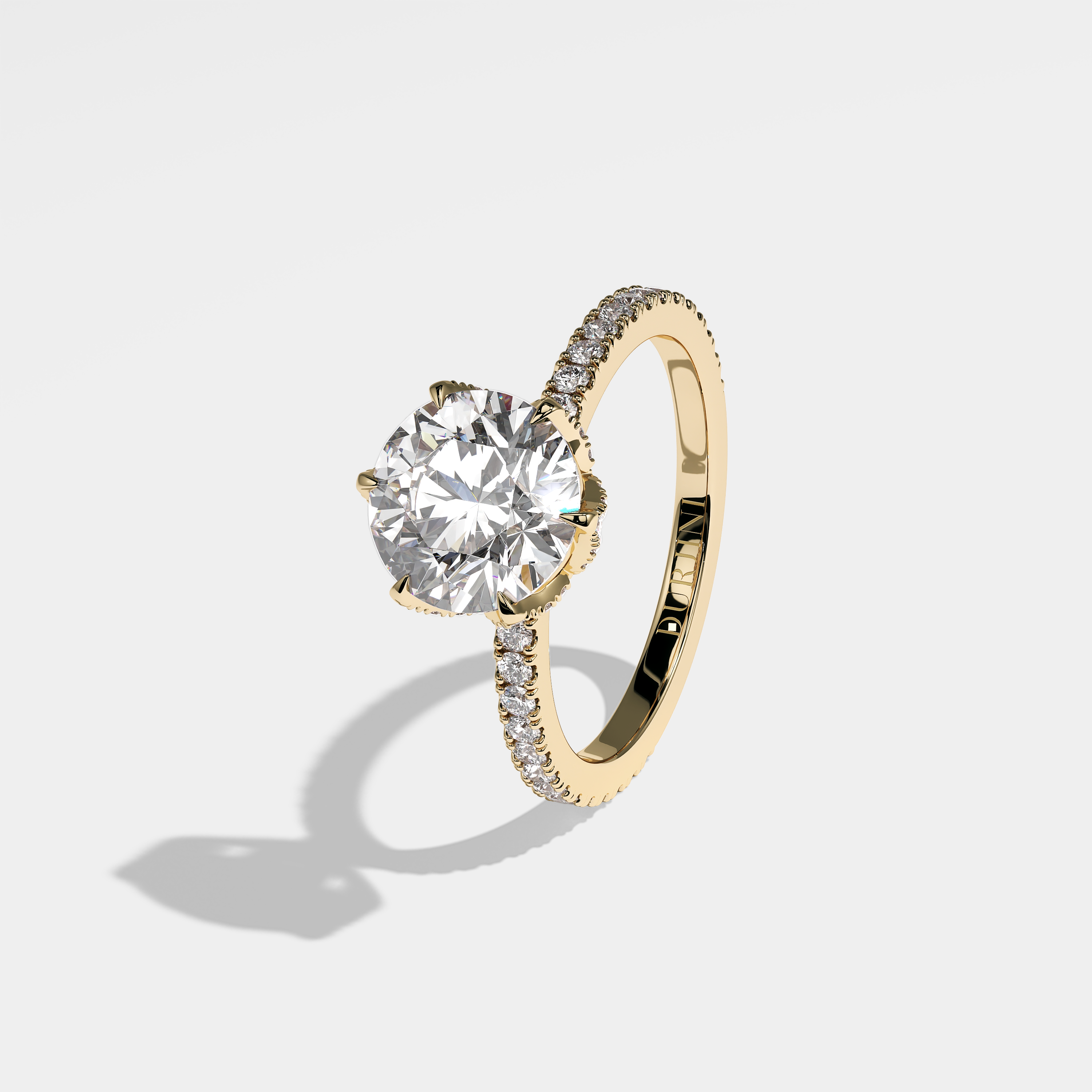Left View – Kurbãni Durjini Niam Diamond Round Brilliant Engagement Ring Yellow Gold
