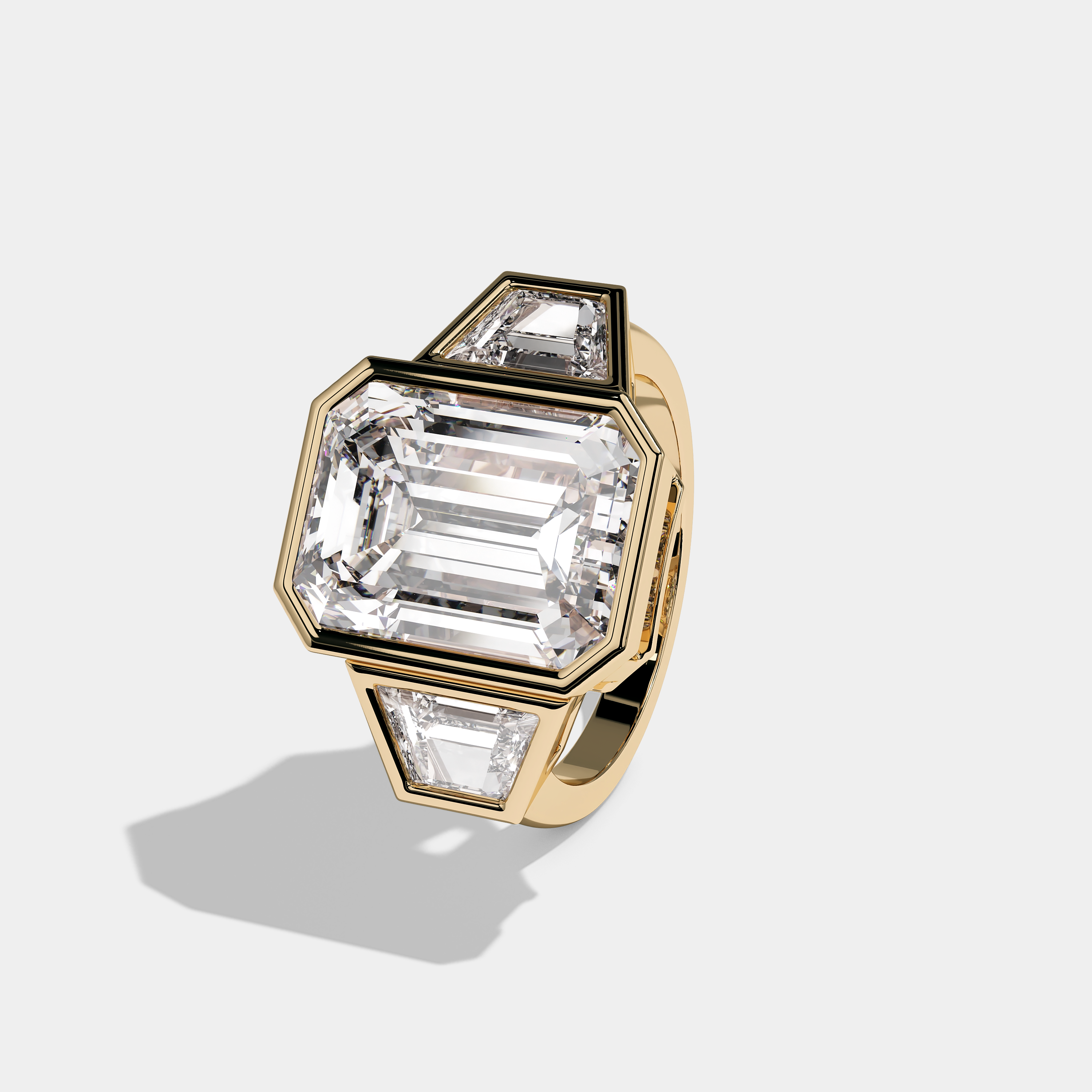 Left View – Kurbãni Durjini Rebello Diamond Emerald Cut Bezel Engagement Ring Yellow Gold