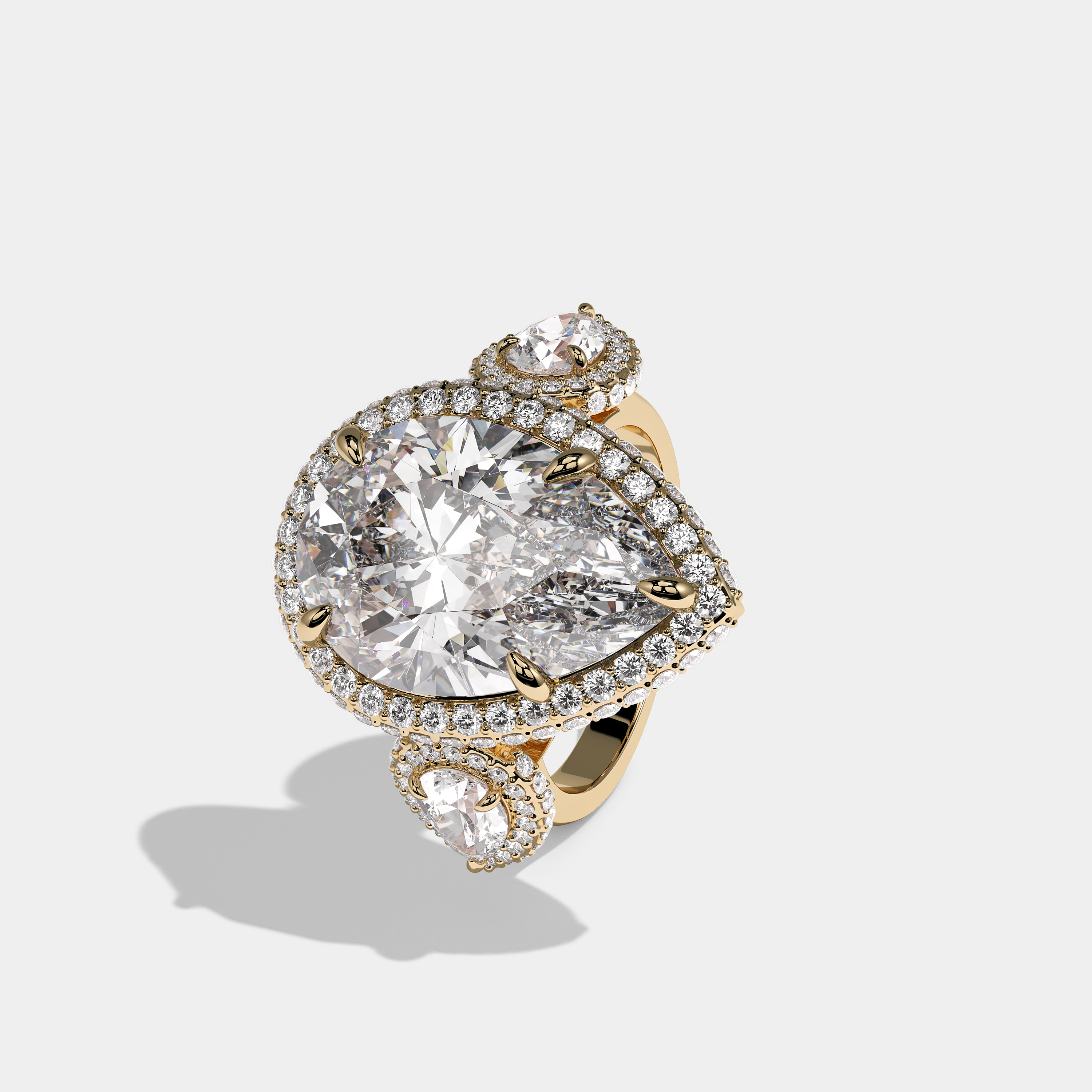 Left View – Kurbãni Durjini Isabella Sereine Diamond Pear Halo Engagement Ring Yellow Gold