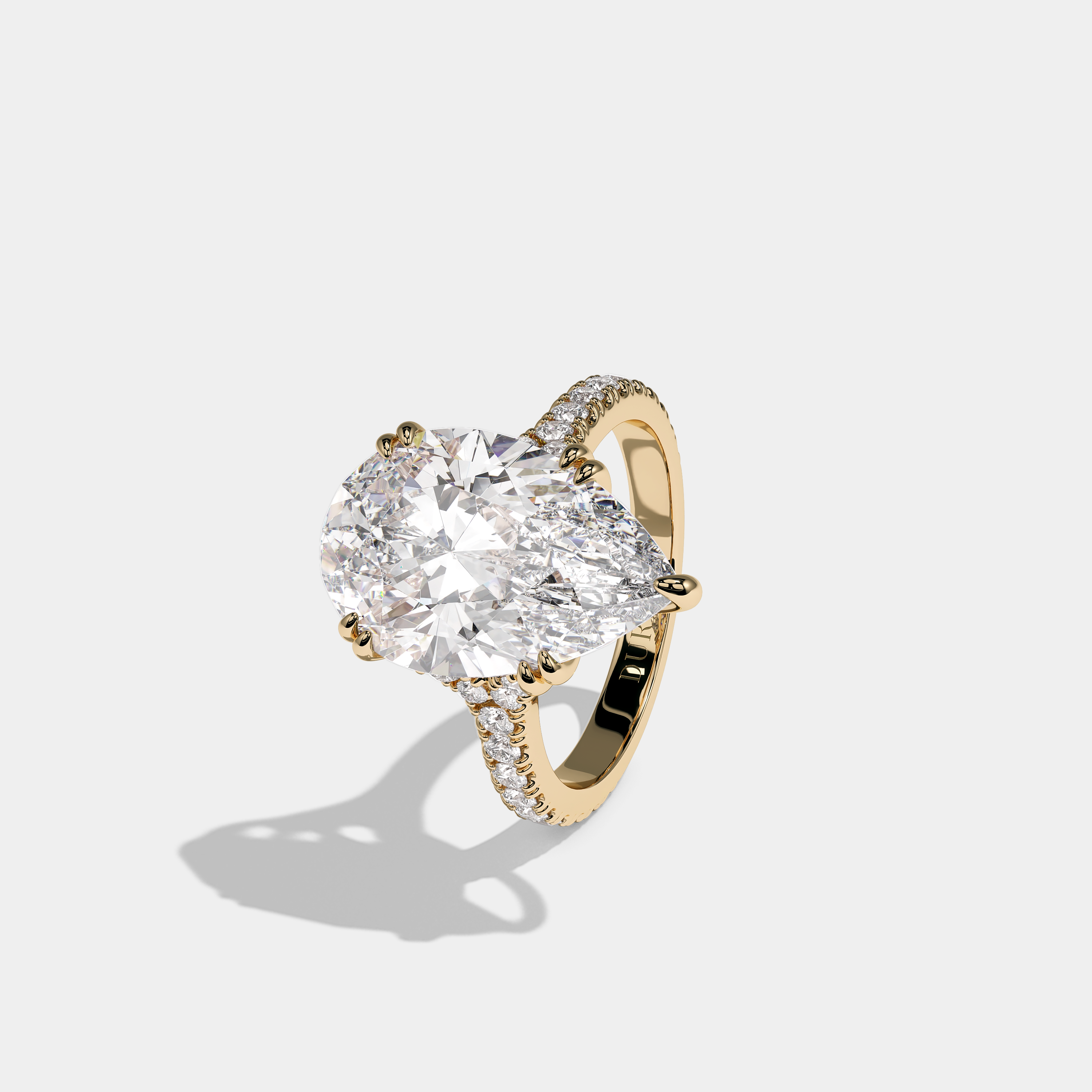 Left View – Kurbãni Durjini Rochefort Royale Diamond Pear Halo Engagement Ring Yellow Gold