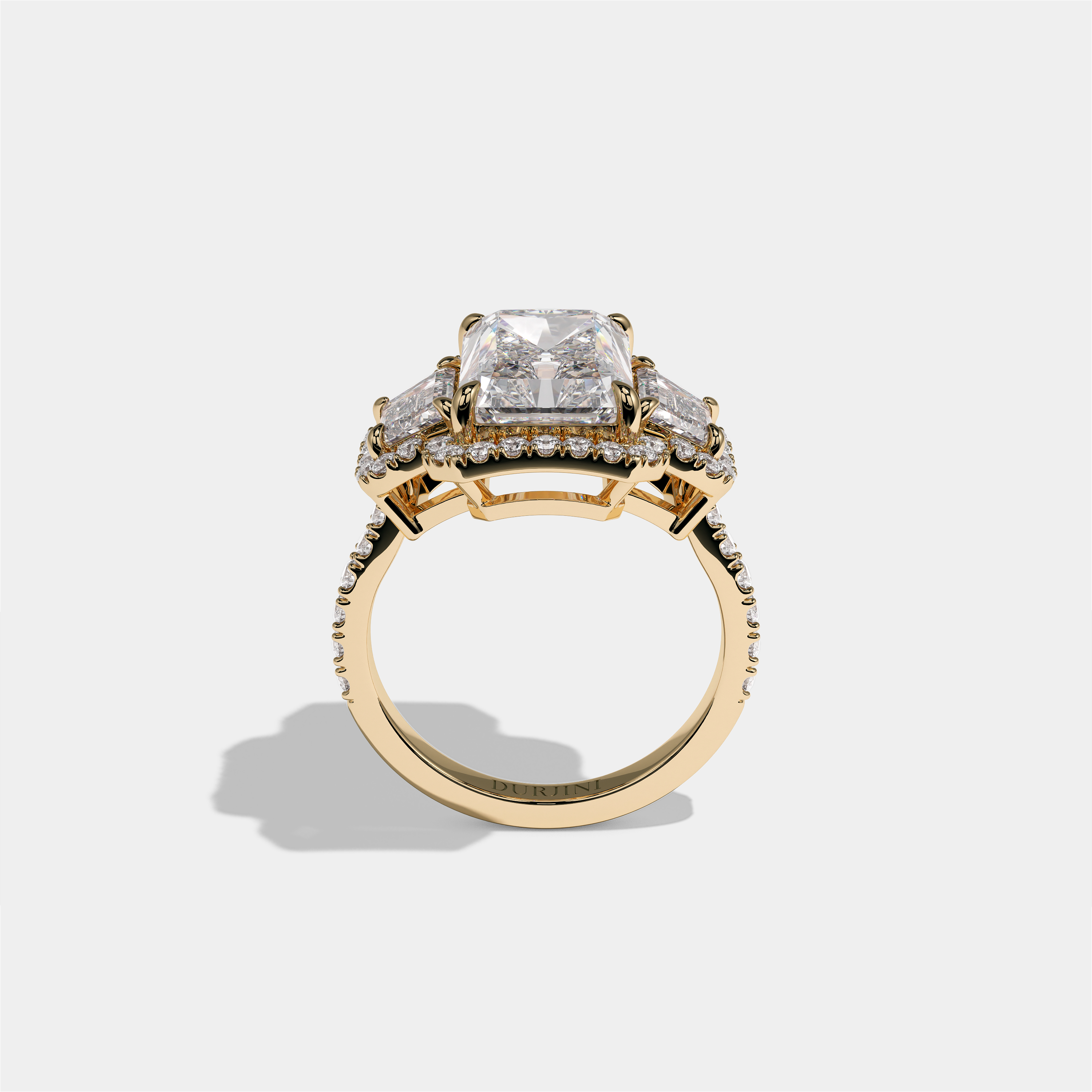 Constance Duchess radiant halo diamond engagement ring in 18K yellow gold by Kurbãni Durjini, full view
