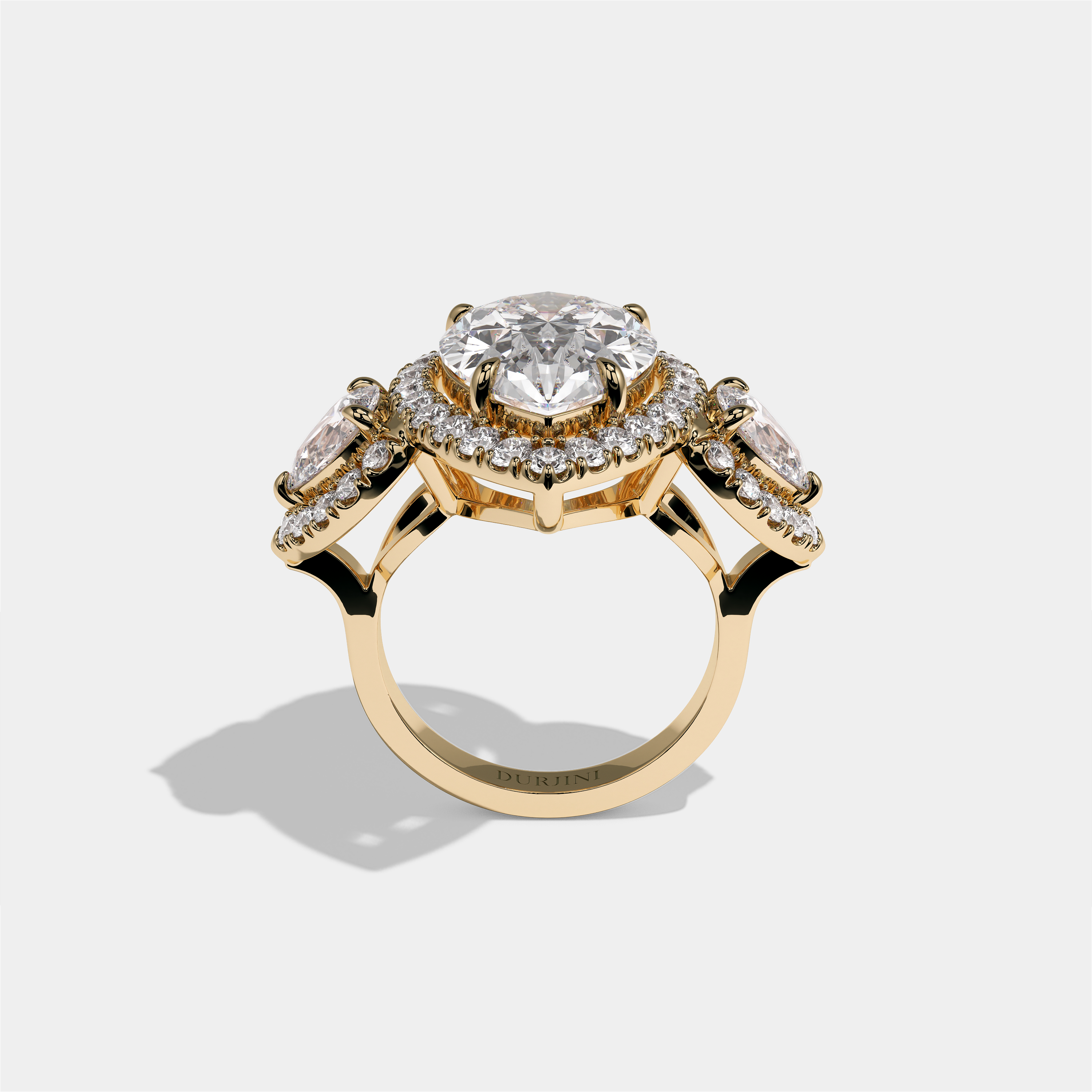 Dorothea Duchess diamond pear halo engagement ring in 18K yellow gold by Kurbãni Durjini, full view