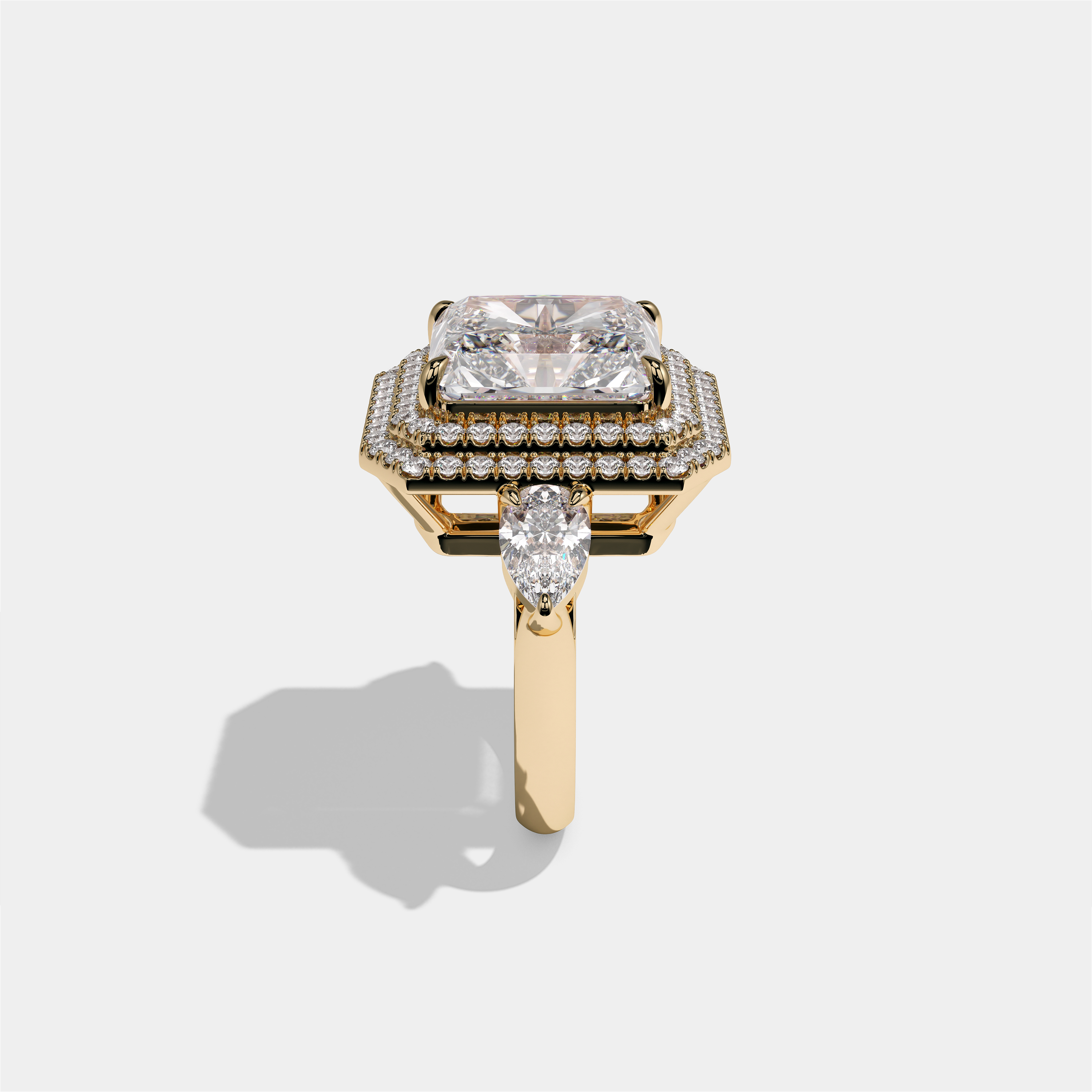 Helena Duchess Rosalind diamond radiant engagement ring in 18K yellow gold by Kurbãni Durjini, side view