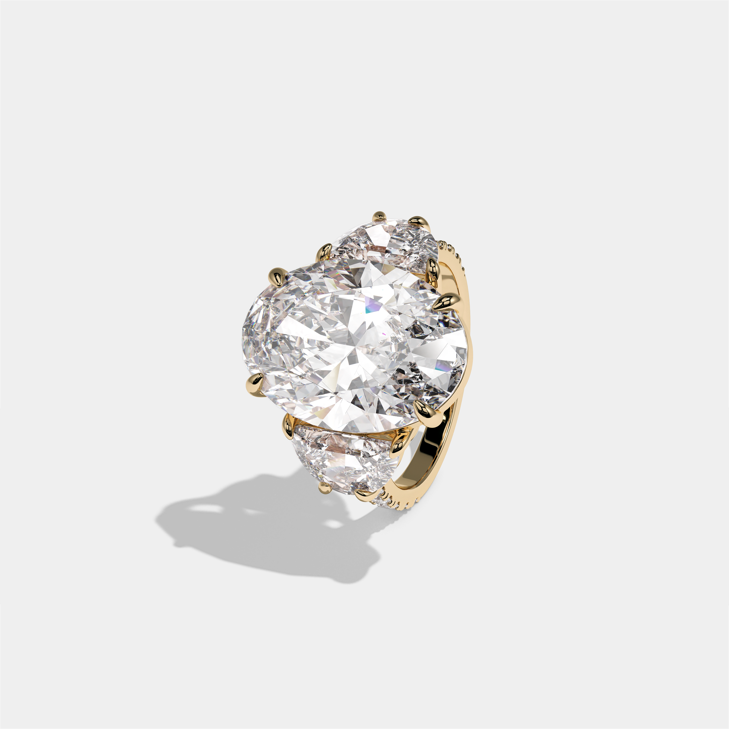 Philippa Countess Agnes diamond oval halo engagement ring in 18K yellow gold by Kurbãni Durjini, left view