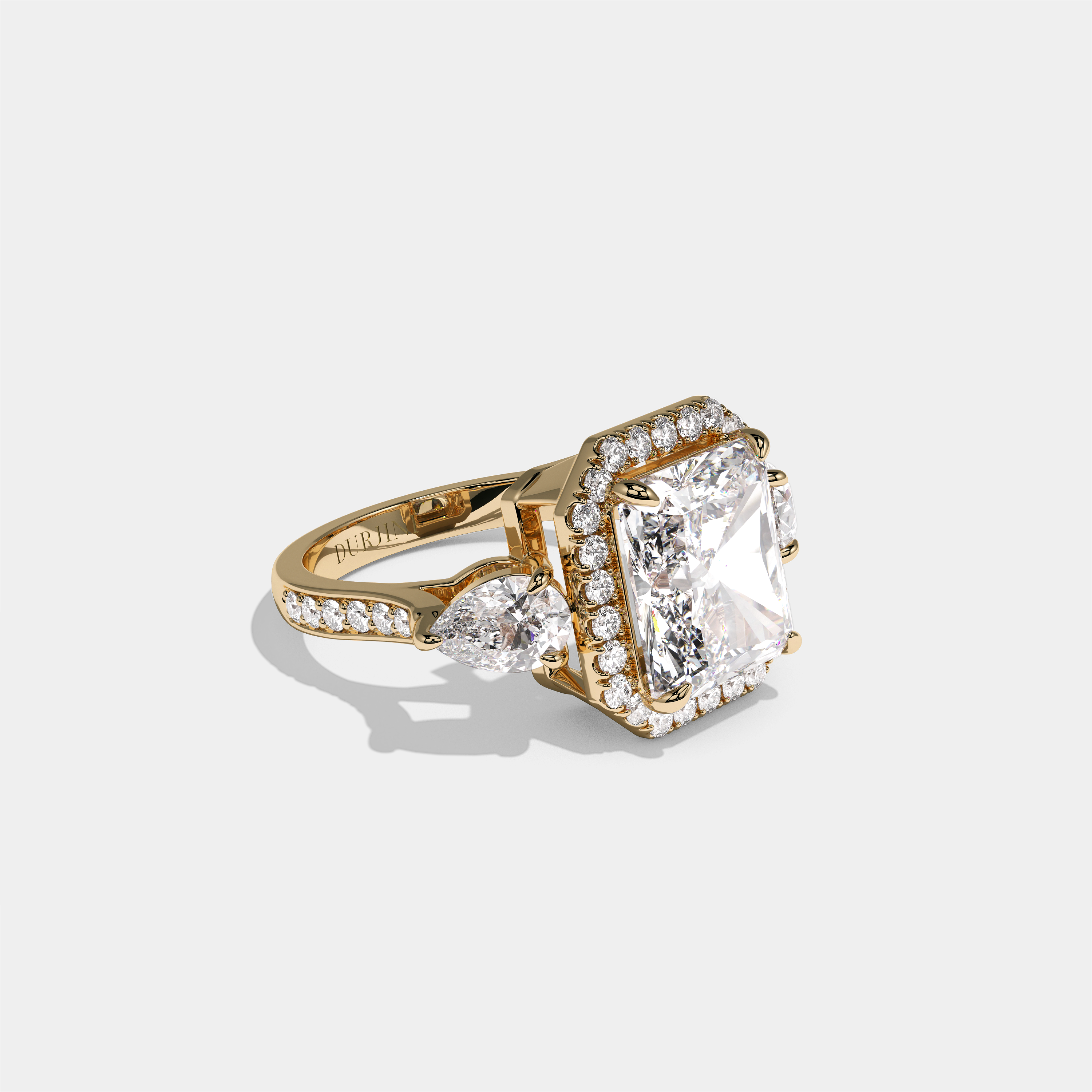 Marian Viscountess Letitia diamond radiant halo engagement ring in 18K yellow gold by Kurbãni Durjini, right view