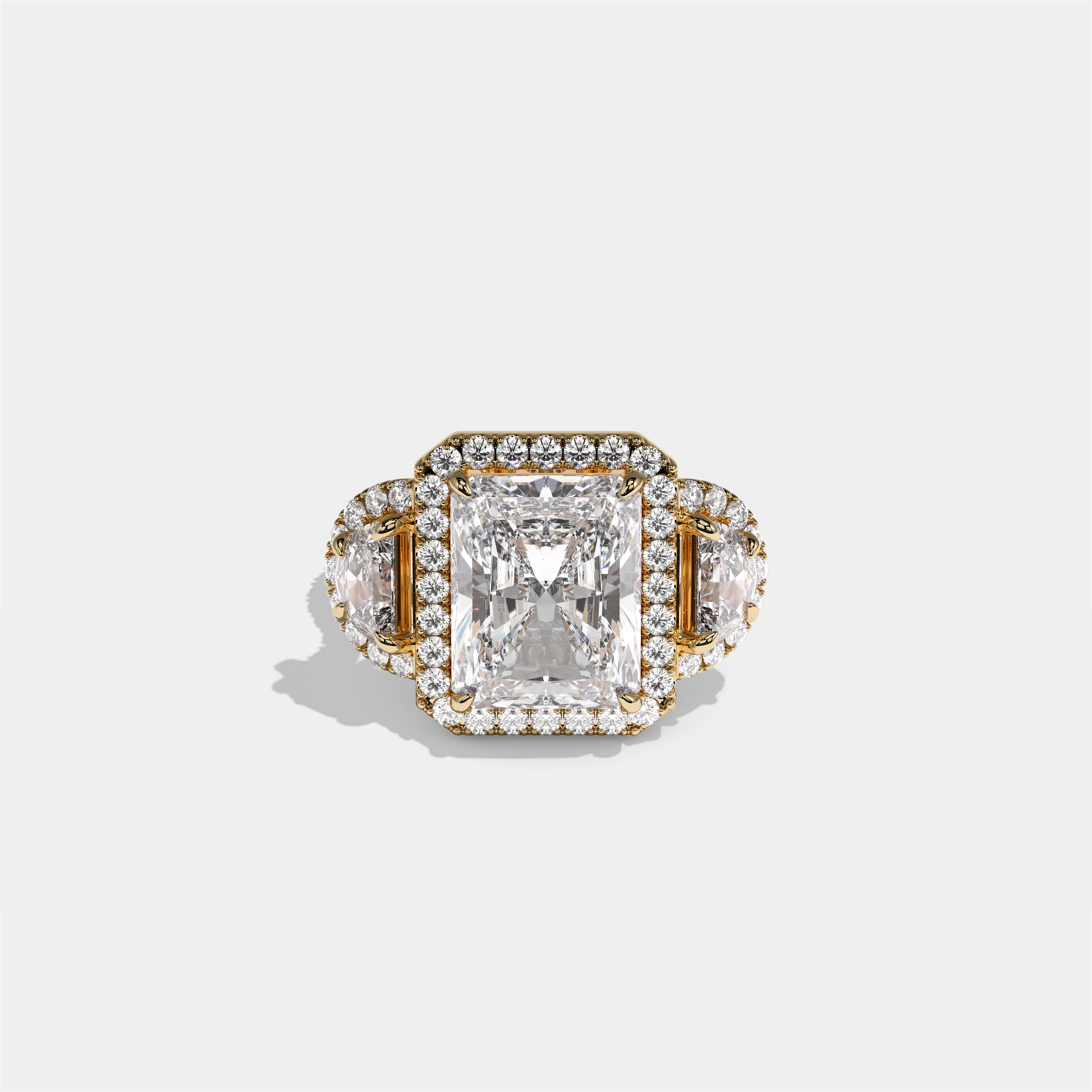 Aveline Lady Godiva diamond radiant halo engagement ring in 18K yellow gold by Kurbãni Durjini, front view