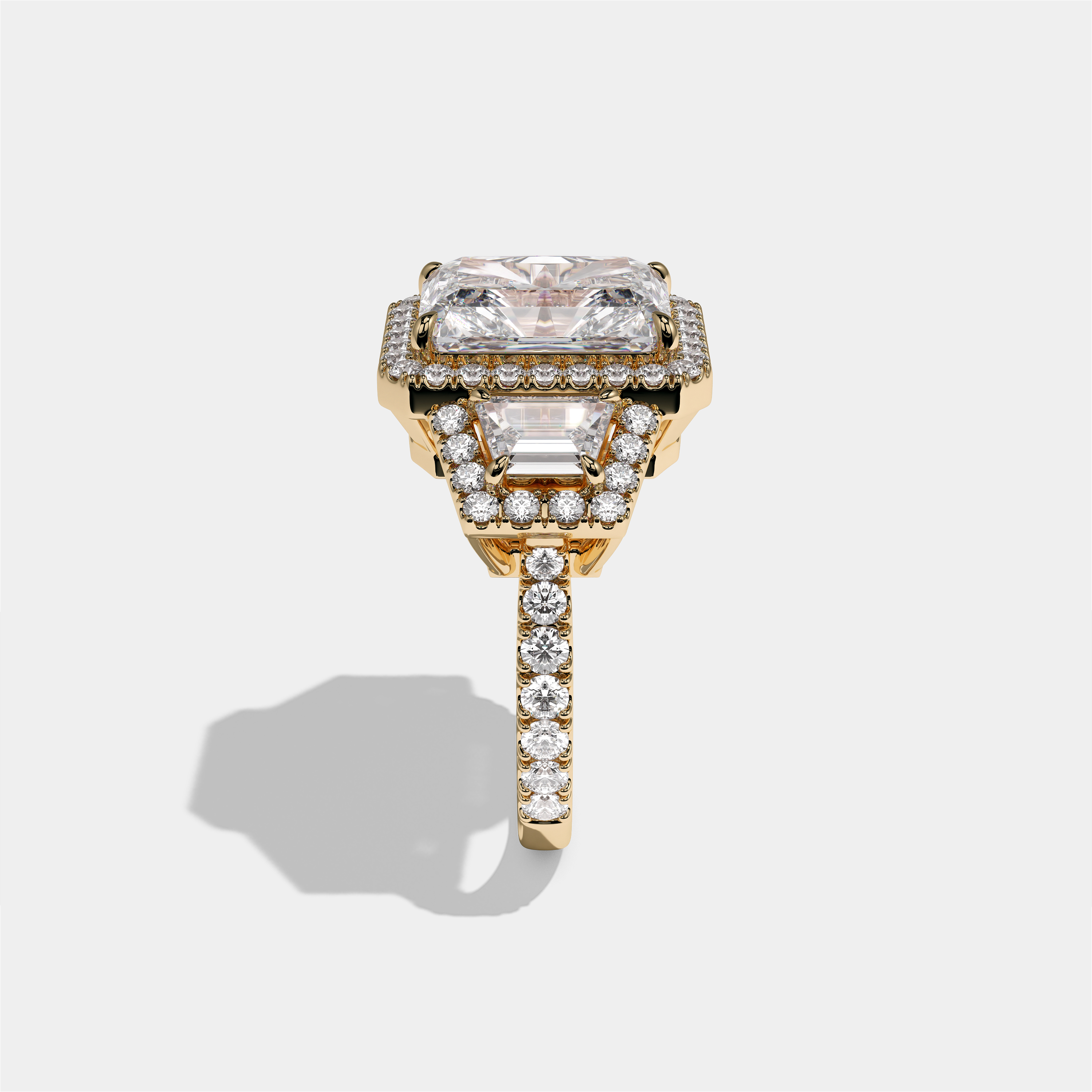 Bryony Lady Everild diamond radiant halo engagement ring in 18K yellow gold by Kurbãni Durjini, side view