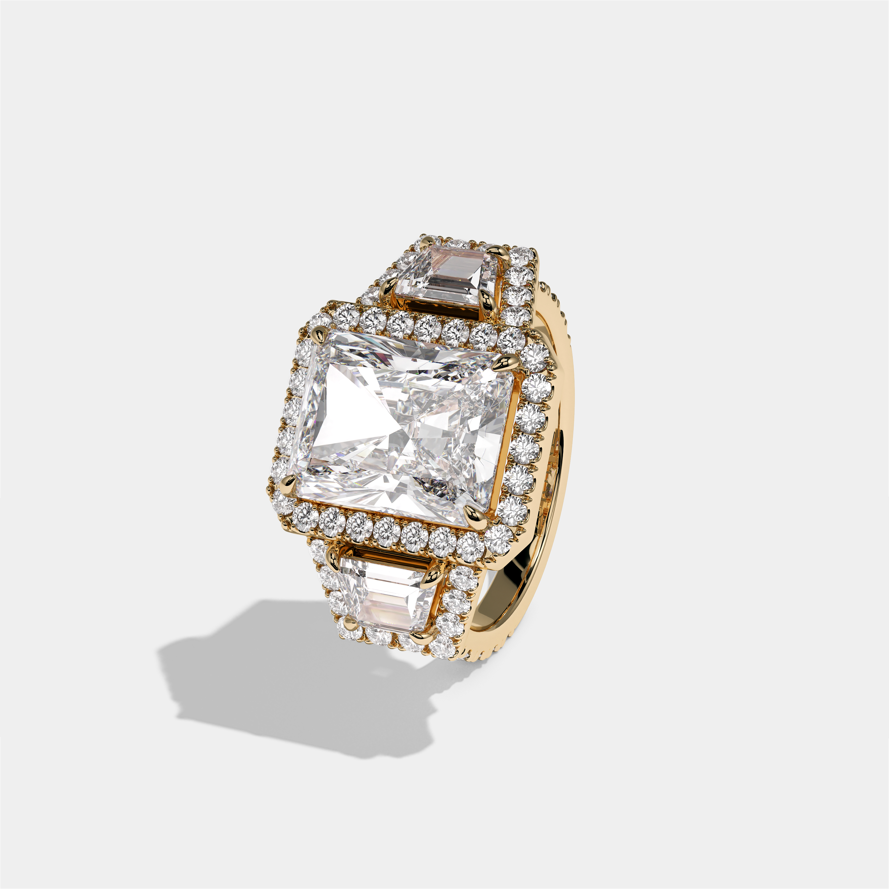 Bryony Lady Everild diamond radiant halo engagement ring in 18K yellow gold by Kurbãni Durjini, left view