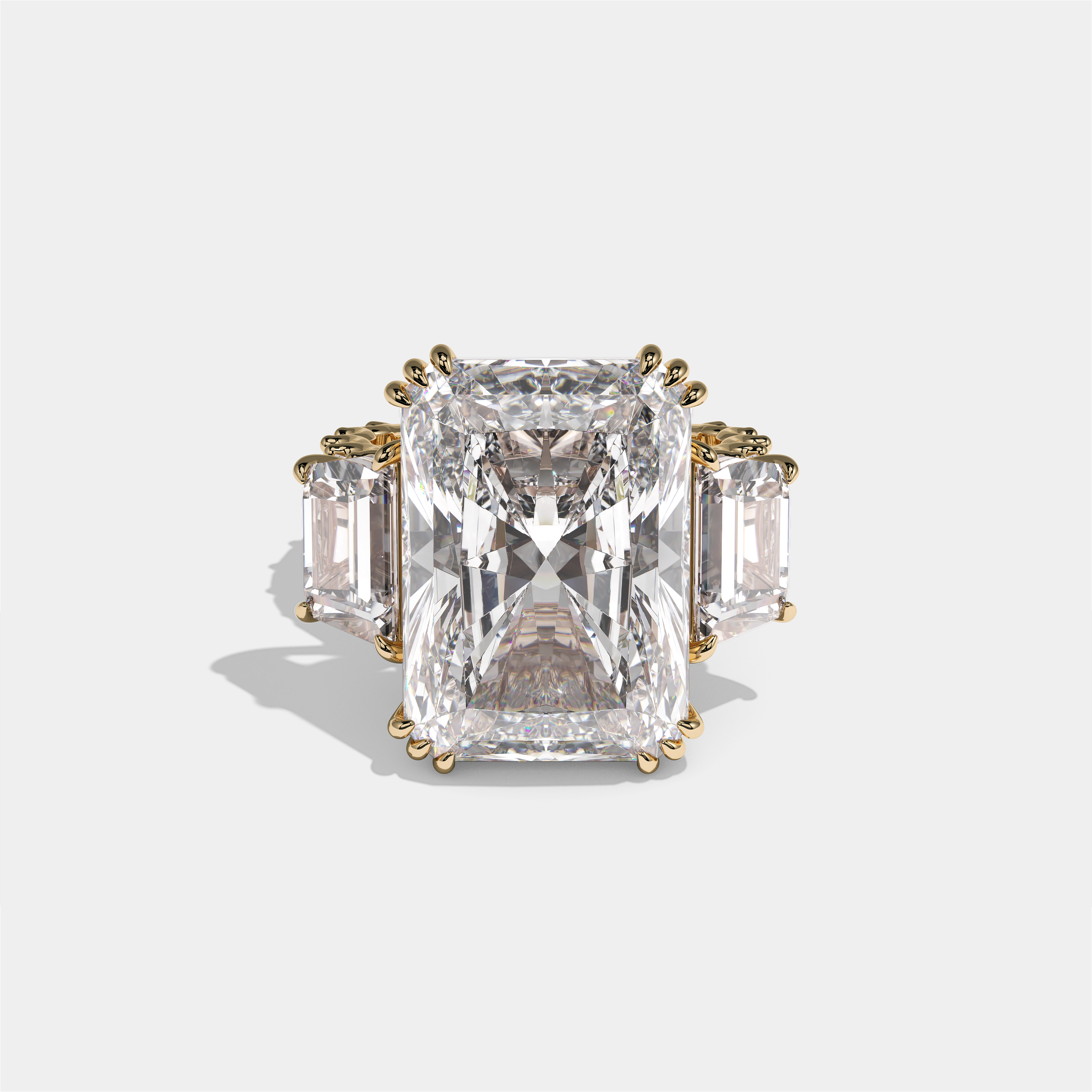 Etheldreda Lady of Ely diamond radiant halo engagement ring in 18K yellow gold by Kurbãni Durjini, front view