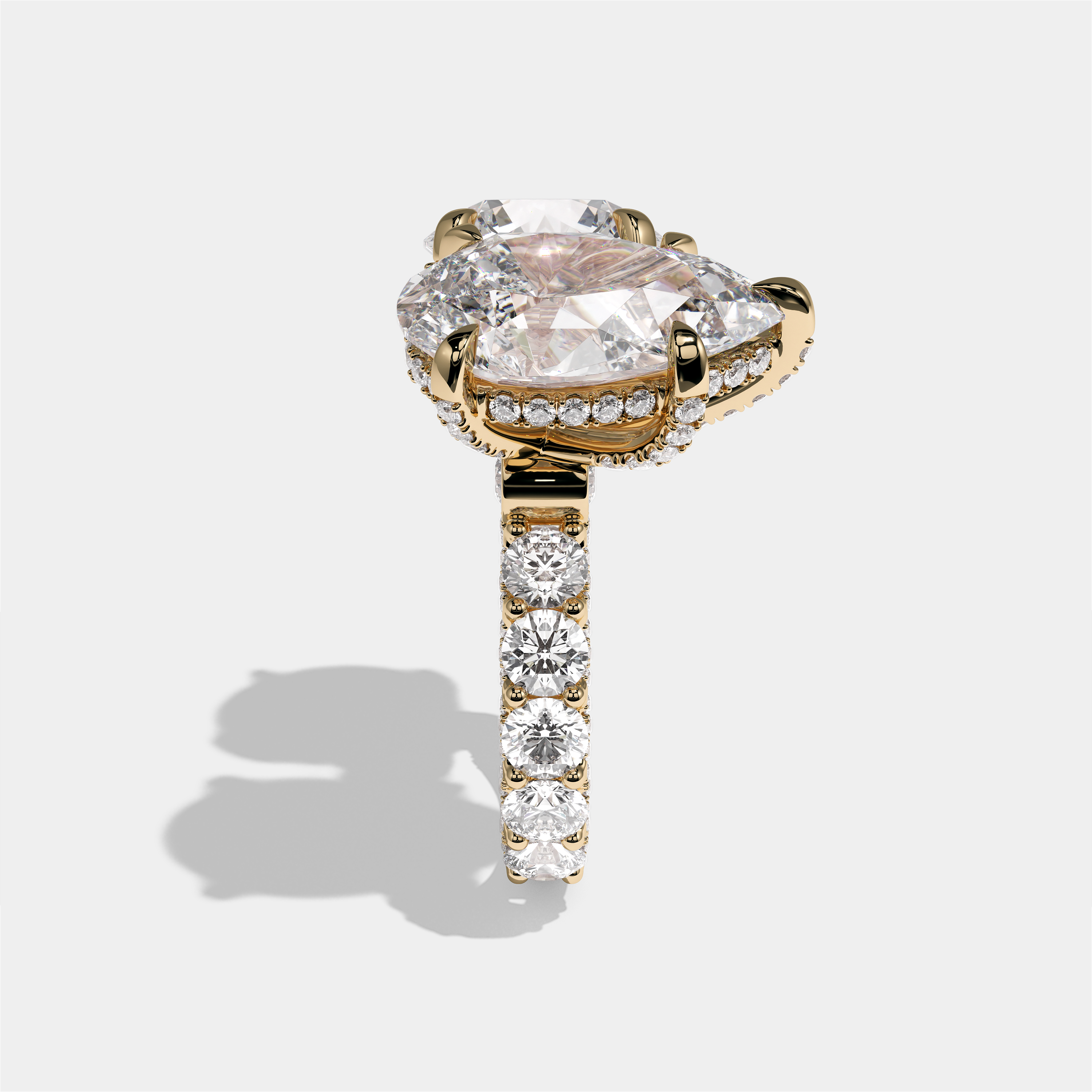 Batya Lady of Grace diamond pear toi moi halo engagement ring in 18K yellow gold by Kurbãni Durjini, side view