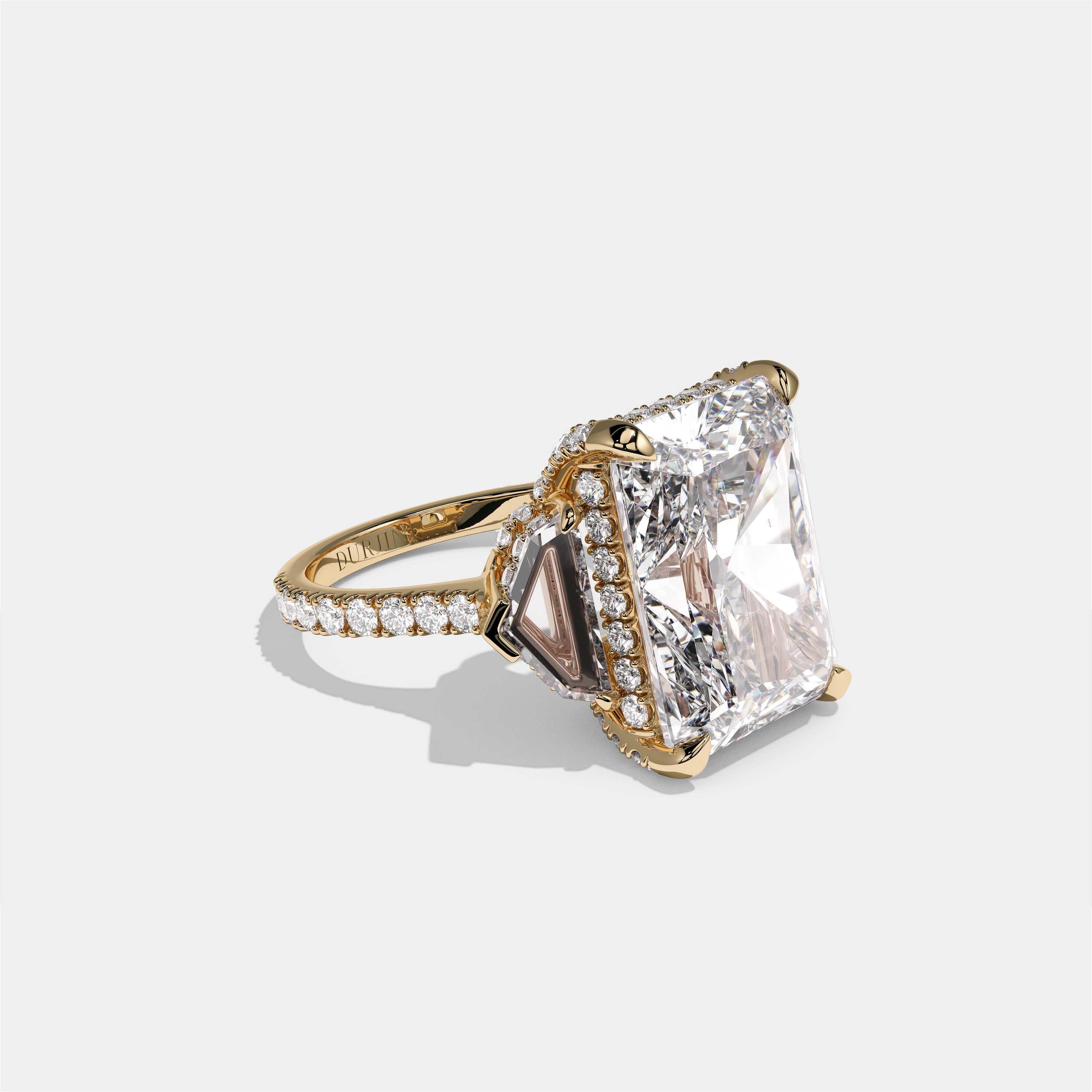 Dinah Lady Fairbourne diamond radiant halo engagement ring in 18K yellow gold by Kurbãni Durjini, right view
