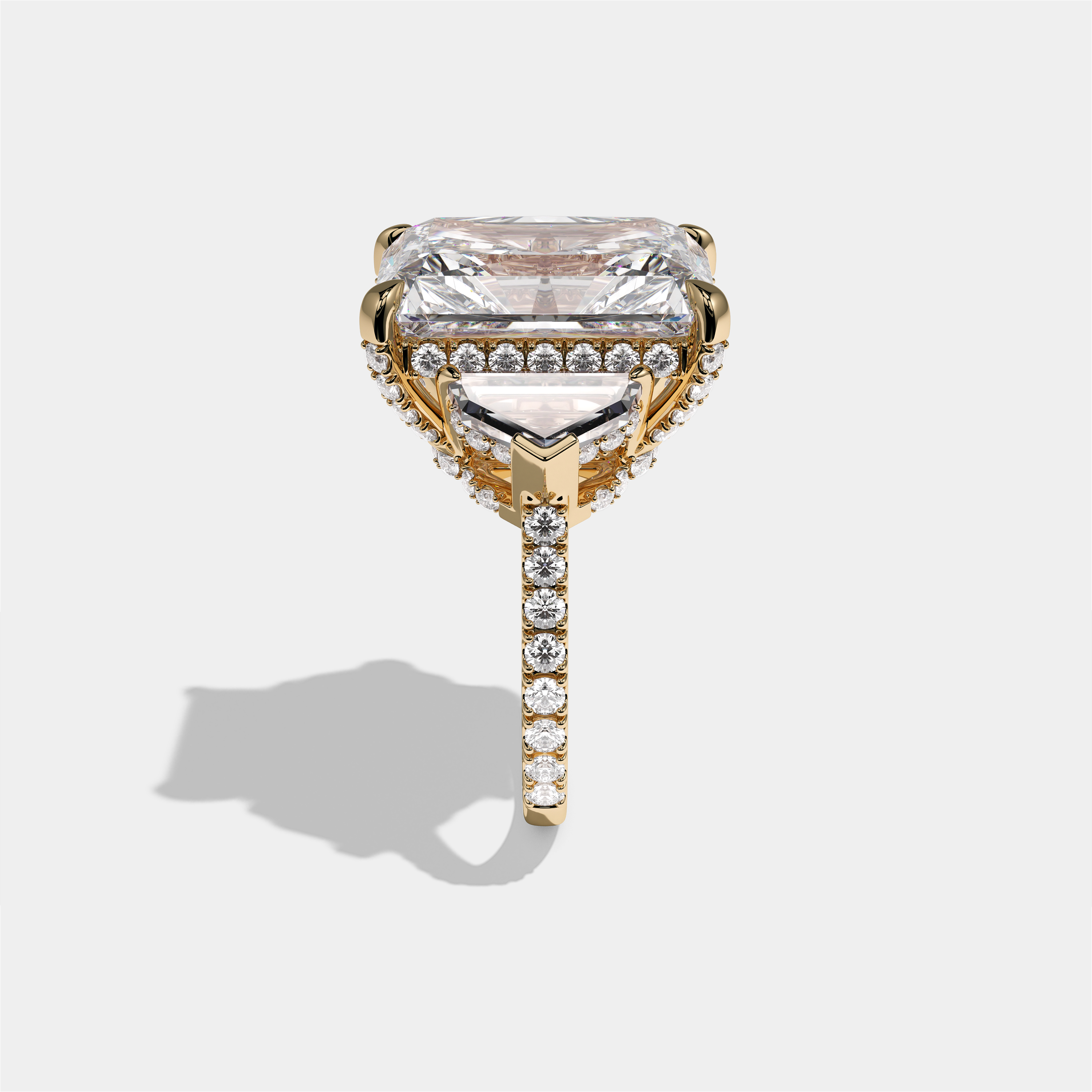 Dinah Lady Fairbourne diamond radiant halo engagement ring in 18K yellow gold by Kurbãni Durjini, side view