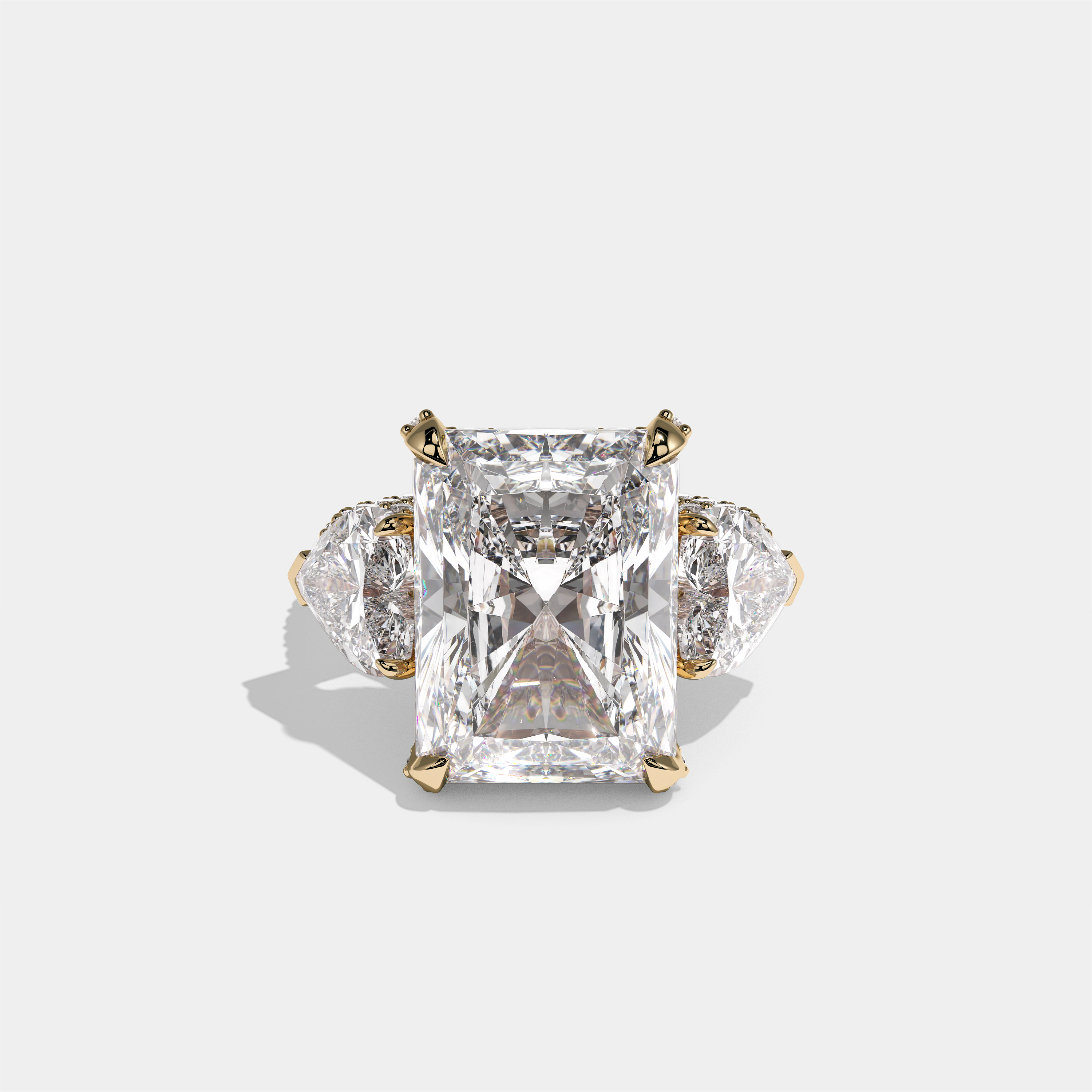 Chaya Lady Ravenscroft diamond radiant halo engagement ring in 18K yellow gold by Kurbãni Durjini, front view