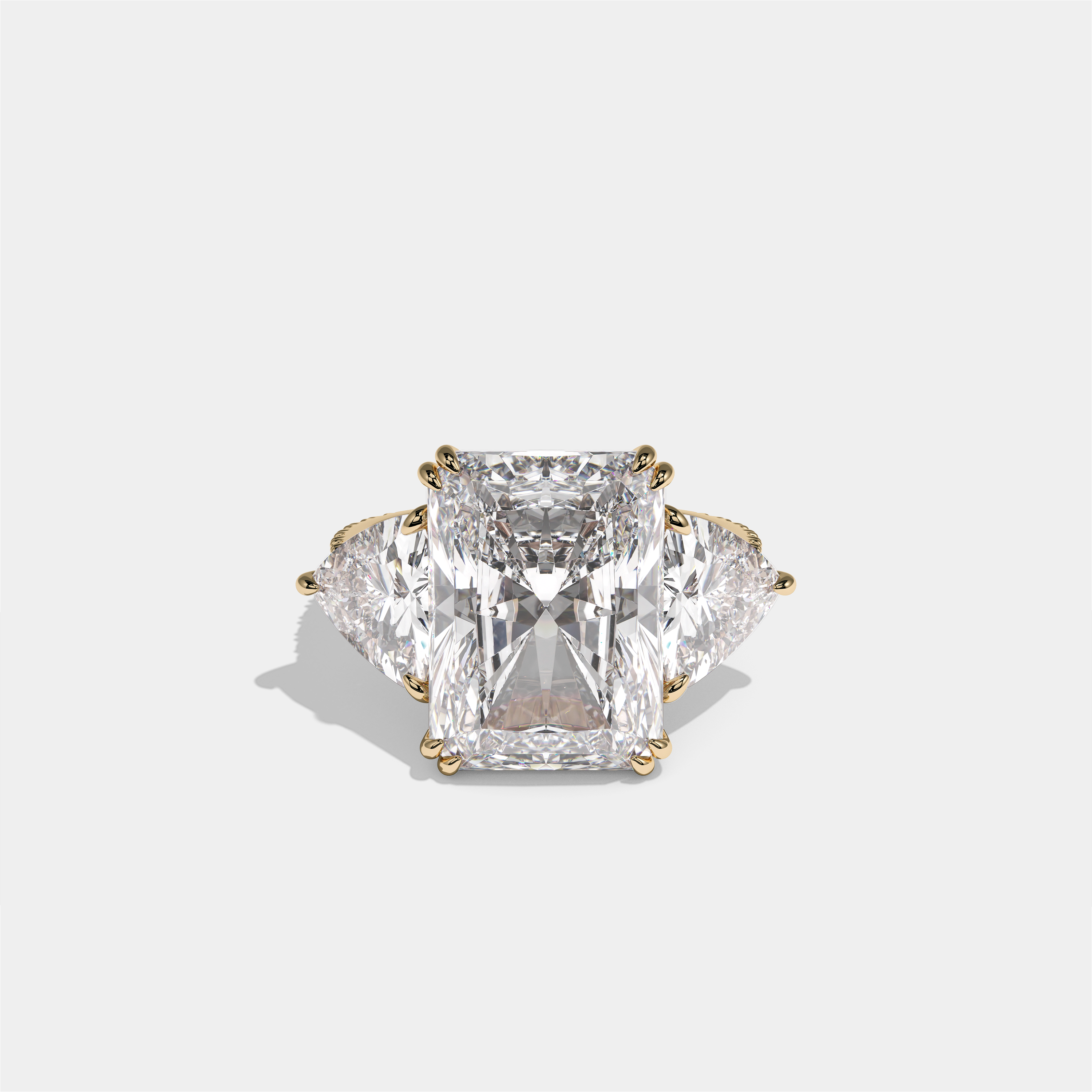 Tzipporah Lady Highbourne diamond radiant halo engagement ring in 18K yellow gold by Kurbãni Durjini, front view