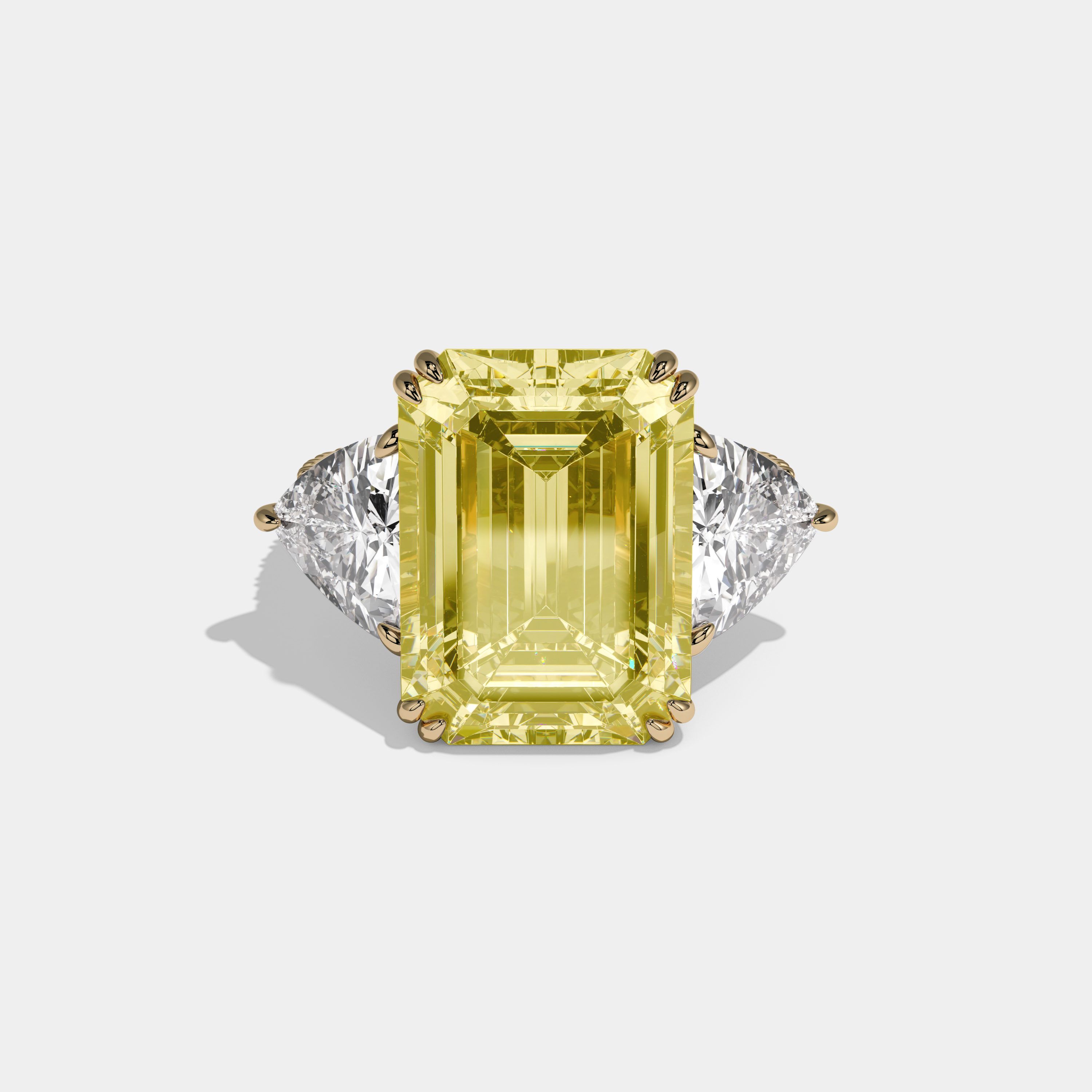 Elizabeth Fancy Yellow Emerald Cut Diamond Halo Engagement Ring With Twin Trillion Cut Sides 10ct 18K Yellow Gold