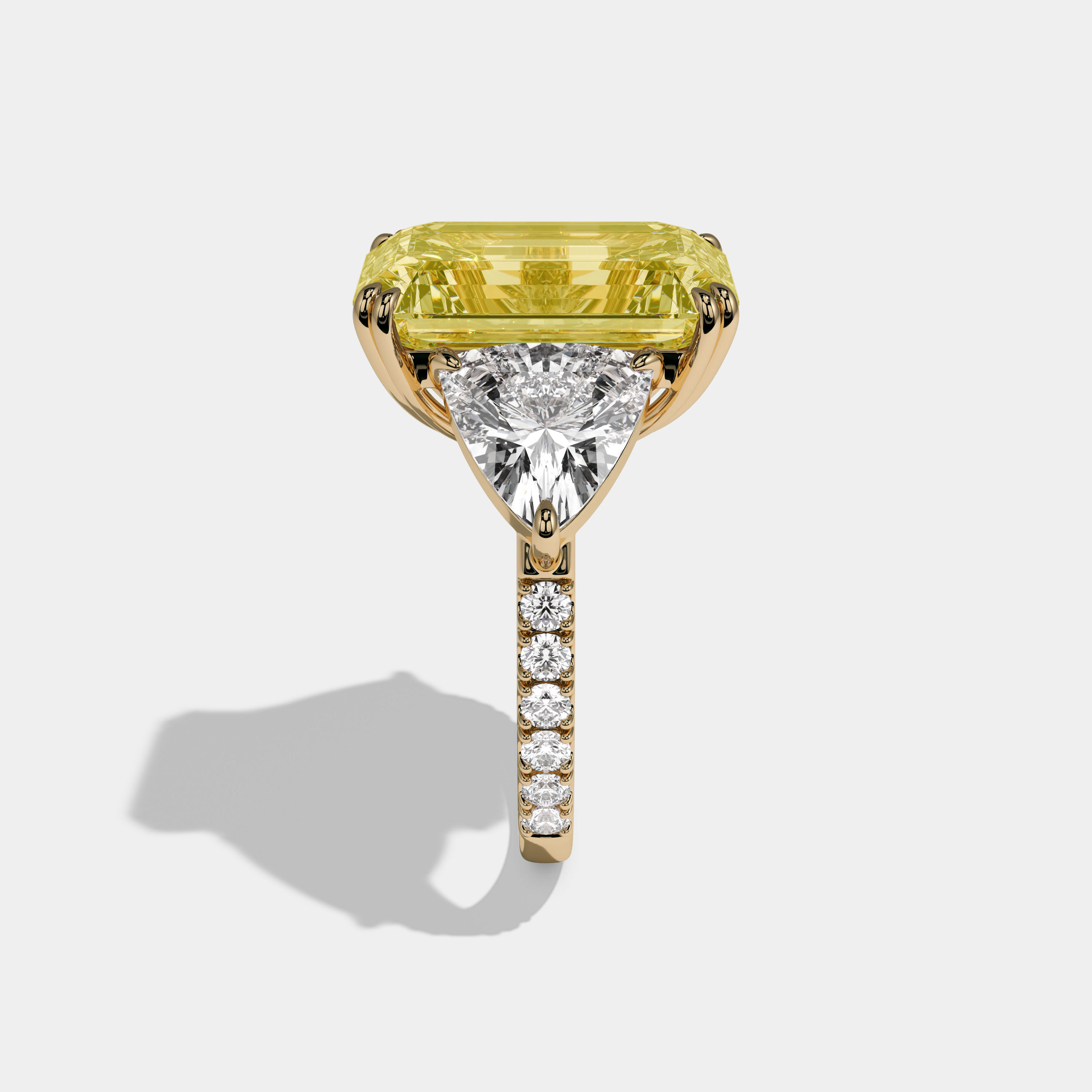 Elizabeth Fancy Yellow Emerald Cut Diamond Halo Engagement Ring With Twin Trillion Cut Sides 10ct 18K Yellow Gold