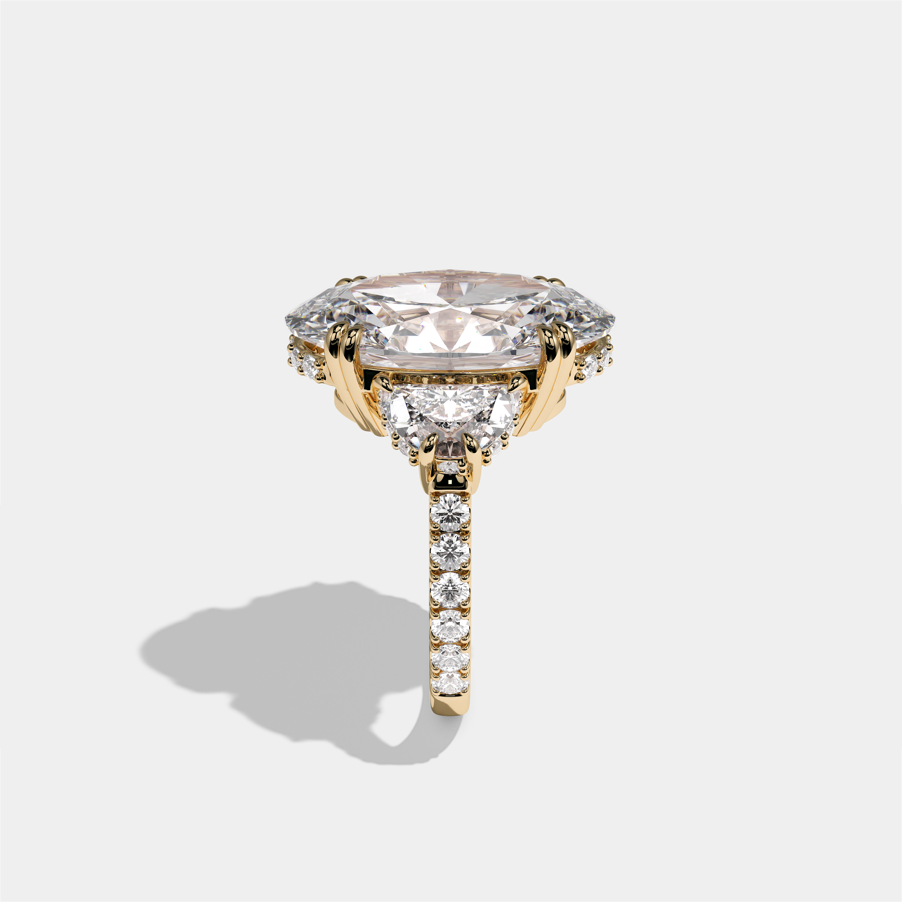 Leah Lady Everly diamond oval halo engagement ring in 18K yellow gold by Kurbãni Durjini, side view