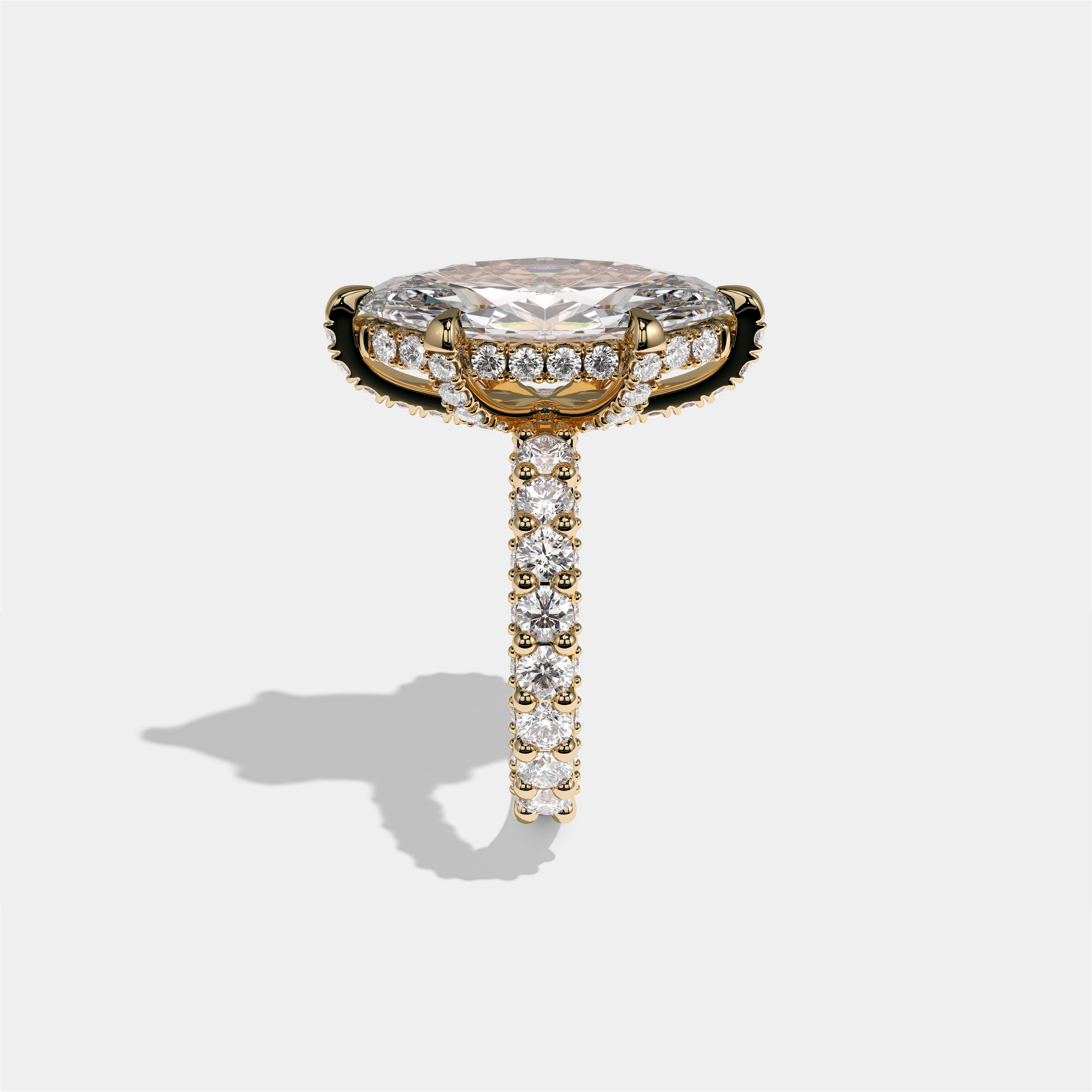 Aviva Ravenscroft diamond marquise halo engagement ring in 18K yellow gold by Kurbãni Durjini, side view